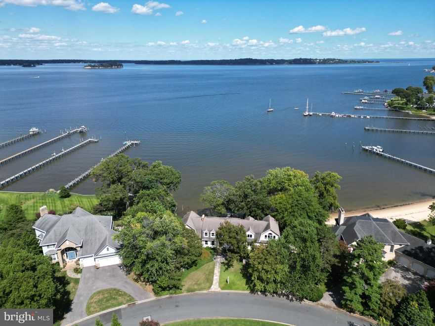 Exceptional Waterfront Opportunity in Coveted Ulmstead Estates! This stunning 0.59-acre property offers 150 feet of prime Magothy River frontage, complete with a private beach and sweeping water views. This property even offers the hard to find trifecta of public water, sewer & natural gas!  An expansive 4,000+ sq ft structure currently sits on the lot, providing the perfect canvas to design and build your dream coastal retreat. Imagine mornings with breathtaking sunrises, afternoons spent crabbing, fishing, or sailing, and evenings taking in the tranquil river setting—all from your own backyard. With a generous lot, protected shoreline, and the unparalleled amenities of Ulmstead Estates, this is a true waterfront gem awaiting your vision. The coveted Ulmstead Estates community offers a vibrant lifestyle with a marina, clubhouse, pool, tennis courts, and trails. Located in the Blue-Ribbon Broadneck School district and just 5 miles to downtown Annapolis and Severna Park. Convenient to Baltimore, BWI, Ft. Meade/NSA and Washington, DC. You literally have the best this region has to offer in a 30-mile radius. Welcome Home!