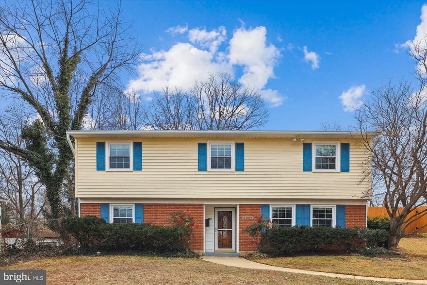 Welcome home to this meticulously maintained and renovated single family home in Sunny Ridge Estates, a spacious and thoughtfully updated residence on a large and scenic .30 acre private lot, just minutes from Rose Hill shopping center and a short distance from Old Town Alexandria, Kingstowne, and major commuter routes/transit options, as well as parks and schools. The inviting foyer greets you upon entry into the finished lower level, which features new luxury vinyl plank flooring and boasts a large versatile family room, a spacious bedroom/office, as well as unfinished storage space/laundry area, and sizeable workshop area. The entry level also incudes a tastefully renovated full bathroom, with modern tile and finishes. 

The generously appointed second level (1,118 sq ft) is the heart of the home, which has been freshly painted and includes newly refinished gleaming hardwood floors. The seamlessly flowing floor plan features a recently renovated kitchen with stylish cabinets, tile backsplash and matching appliances. The large living room and formal dining room feature picture-perfect exterior views -- an ideal setting for gatherings and entertaining. Three spacious bedrooms with ample closet space and ceiling fans round out this functional, well-appointed floorplan.  The second full bathroom has been renovated with beautiful Turkish limestone tile. What's more, the second level touts an always-desirable south-facing sunroom/three-season room with new durable flooring, a perfect space to enjoy the scenic and expansive fenced-in backyard with landscaped green space and mature trees, one of the nicest exterior settings in the community. The home also features a low-maintenance trex deck, expanding the home's living space, with easy access to the kitchen for grilling needs. 

Other major updates include brand new windows, which accentuate the home's immense natural light.  There is also plenty of storage within the insulated attic. No HOA, as well! Don't miss this opportunity to own a single family home that provides essential space, upgrades and vibrant location, and situated on an large beautiful lot.