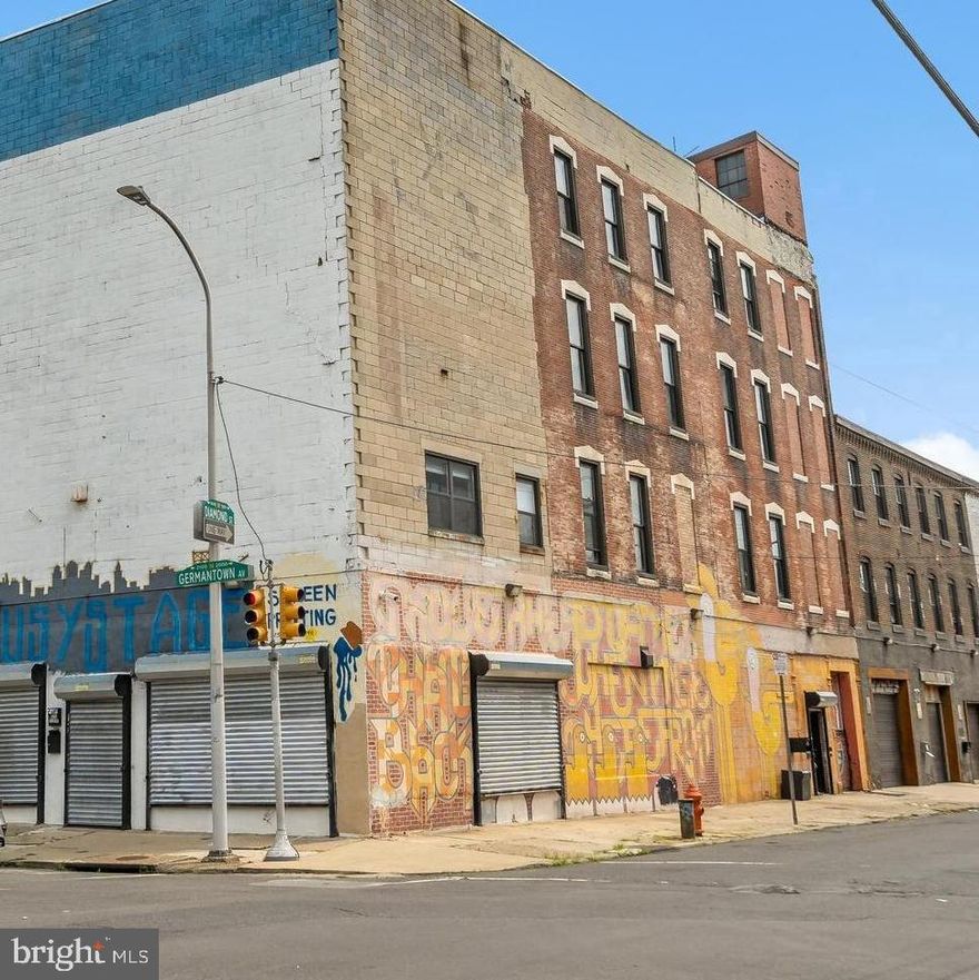 IRMX Mixed-Use Industrial | ±24,000 SF Adaptive-Reuse Opportunity

Substantial former industrial building positioned along one of the most actively evolving stretches of Germantown Avenue, where historic warehouses are increasingly being repositioned for creative commercial, residential, and mixed-use projects. The property totals approximately 24,000 square feet across interconnected structures and sits on a 0.17-acre parcel with roughly 40 feet of frontage and a depth of about 123 feet.

The existing improvements date to the early 20th century and retain the character that continues to attract adaptive-reuse investment throughout Olde Kensington and Fishtown’s expansion corridor. Exposed timber beams, original hardwood flooring, and three sides of windows provide the volume and natural light sought by modern office, studio, or maker-space users.

The building is serviced by two stairwells and an elevator, with multiple restrooms already distributed throughout. At grade, polished concrete floors and three garage bays with individual overhead doors support light industrial, production, or flexible commercial occupancy.

Zoned IRMX, the property sits within a district intended to accommodate a blend of low-impact industrial, artisan, and residential uses—an approach created to allow legacy industrial buildings to transition into mixed-use environments without losing employment-generating functions. This zoning framework has shaped nearby projects that integrate residential units with ground-floor industrial or creative workspace, reinforcing the corridor’s hybrid live-work character.

Surrounding Germantown Avenue has seen continued reinvestment, including newer flex and mixed-use buildings and additional infill residential development contributing to the neighborhood’s steady transformation.

With five connected structures, fee-simple ownership, and vacancy allowing immediate repositioning, the property offers a clear path for an owner-user, investor, or developer seeking scale in a location bridging Northern Liberties, Fishtown, and Kensington. The roof structure and massing also lend themselves to potential amenity or deck conversion, subject to approvals.

Ideal for: creative office, light production, multi-tenant commercial, or phased mixed-use redevelopment consistent with the corridor’s ongoing adaptive-reuse trend.