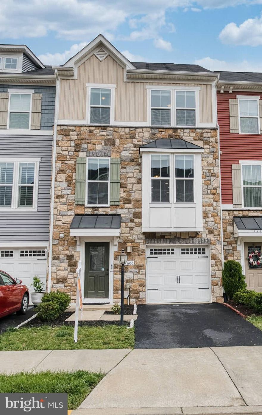 Spacious and bright, move-in ready townhome in sought after Westridge! This beautifully designed home offers a spacious open floor plan filled with natural light. The gourmet kitchen features upgraded granite countertops and a large island—perfect for entertaining. Adjacent to the kitchen, the dining area opens to a stunning deck, ideal for hosting gatherings and enjoying outdoor meals. Upstairs, the expansive primary bedroom includes a walk-in closet and an ensuite bathroom with a luxurious double-headed designer shower. Two additional generously sized bedrooms share a full bathroom with both a shower and a soaking tub. The conveniently located upper-level laundry room adds everyday ease. The lower level includes a half bath, a large rec room, and access to a 1-car garage with ample storage. The basement walks out to a beautifully crafted stamped concrete patio—great for relaxing or entertaining. Located just steps from the community pool, clubhouse, tennis courts, playgrounds, and walking paths, this home offers both comfort and convenience. Close to top-rated schools, shopping centers, and major commuter routes.

Don’t miss this opportunity—this home has it all!