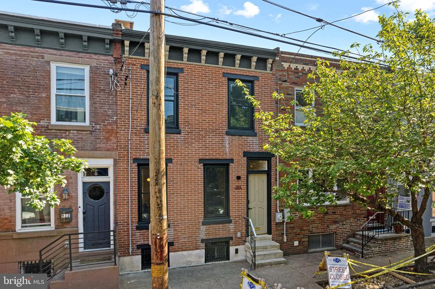 Welcome to East Passyunk Crossing. This stunning newly renovated, 3-bedroom, 2.5-bath home is nestled on a highly desired, tree-lined block in the vibrant heart of South Philadelphia. Step inside to an open, sunlit living room and dining area — the perfect space for entertaining or relaxing in style. The spacious eat-in kitchen is designed for both function and gathering, featuring a large central island and a convenient powder room nearby.

Just off the kitchen you'll find a conveniently located powder room and the backdoor which opens to a covered patio and enormous fully fenced backyard — ideal for outdoor dining, hosting guests, or creating your own private urban oasis.

10-Year tax abatement submitted and pending approval

A restored classic wooden staircase with beautifully crafted balusters leads to three comfortable bedrooms. The two front bedrooms flank a tiled hall bath, while the serene primary Suite offers a walk-in closet and a spacious walk-in shower, accented by a frosted glass window that fills the space with natural light.

Set in one of the city’s most dynamic neighborhoods, this home offers a perfect blend of charm, comfort, and convenience, just steps from top-rated restaurants, parks, and everything South Philly has to offer.