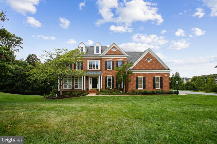 Have you always dreamed of living in Oak Hill Reserve?  Now is your opportunity to live in this coveted neighborhood!  You will be captivated with the interior and exterior of this absolutely stunning home that is perfectly sited on a beautiful .83 acre premium lot . Quality built by Winchester in 2003, the original owners spared no expense when building and maintaining their dream home. It will check every box on your must have list - a grand primary suite with expansive walk-in closets, gracious formal and informal entertaining spaces, 3 car garage, walk-out lower level with in-law suite, sunroom, home theatre and beautiful natural light that streams through the walls of windows. The walk out lower level provides hours of entertainment and fun with a game room, theatre and exercise room, plus excellent options for work/school from home, and multi-generational living. The impressive interior is equaled by the impressive exterior with an inviting front porch providing maximum curb appeal. The expanded deck off the kitchen provides gorgeous views of the large yard.  Situated in the sought after Crossfield, Carson, Oakton school pyramid, and in a prime location with easy access to major commuter routes and metros, the Dulles Airport, Inova Healthcare System and convenient shopping and restaurant options in Fairfax, Reston and Tysons. Come home to 12821 Rose Grove Drive and live the dream!