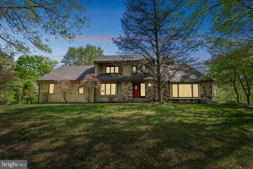 WOW – First time on the market in 36 years! Nestled on 13.77 private acres in prestigious Upper Makefield Township, this impressive 3,600+ sq ft home offers 3 spacious bedrooms and 2.5 baths. The main-level primary suite is conveniently located next to your own private solarium and hot tub—perfect for year-round relaxation. At the heart of the home, the kitchen provides easy access to the formal dining room and a screened-in porch overlooking the scenic backyard. Down the hall toward the garages, you’ll find a large walk-in pantry, laundry room, and a bright home office with custom built-ins and peaceful views. Enjoy views of Bowman’s Tower and quick access to downtown New Hope, Washington Crossing, and Peddler’s Village. This is a rare opportunity to own a one-of-a-kind estate—truly a must-see!