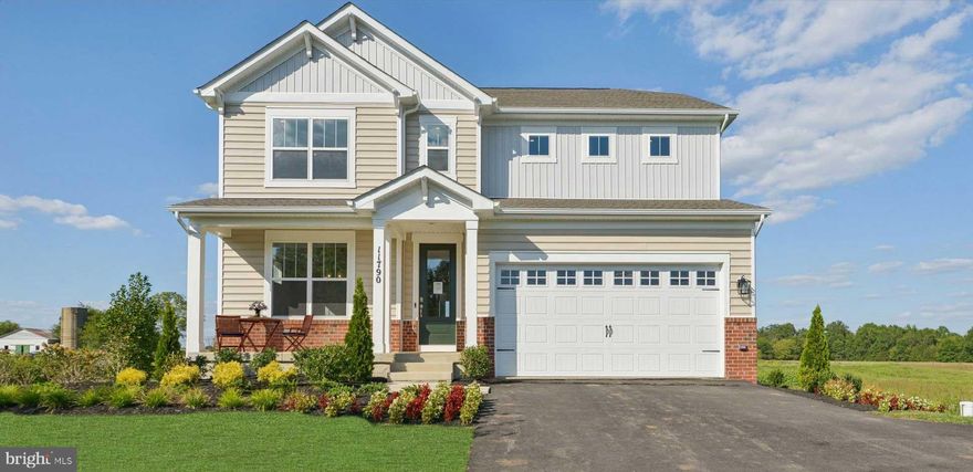 11790 Parkgate Drive is a move-in ready new home in Nokesville, VA! The Hampshire by D.R. Horton is a stunning new construction home plan featuring a total of 4,279 finished square feet of living space, which includes 5 bedrooms, 4 bathrooms, a large loft area, a formal dining room, a rec room, and a 2-car garage. As you’re welcomed into the home, you’re greeted by the spacious formal dining room, the perfect space to entertain your guests on those special occasions. The foyer opens up to a much desired, open concept living space highlighted by a large kitchen with plenty of counter space, upgraded gray cabinets, and a large, modern island overlooking the casual dining area and living room. Tucked off the living room is a downstairs bedroom and full bath – the ideal guest suite or home office. Upstairs you’ll find a generous loft area, laundry and three additional bedrooms, including the primary suite, which highlights a charming sitting area, huge walk-in closet and a luxurious bathroom. Enjoy thoughtful accents throughout the home such as a tray ceiling in the owner’s suite and dining room, and a traditional fireplace in the living room. Up to $10,000 total closing cost is tied to the use of DHI Mortgage. *Photos are of the actual home. Rooms are virtually staged.*