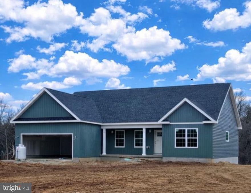 June 2026 delivery on this Brand New ranch home!!   This 1,670 square foot Ranch style home boasts the sought after split bedroom design. The kitchen/dining combo is open to the expansive great room and features vaulted ceilings.  Quartz, ceramic, luxury vinyl plank flooring, carpet and stainless steel appliance package. Primary bath has a separate tiled shower and soaking tub! Home is larger than it looks providing maximum usage of interior space. The front porch is great for evenings relaxing in a country setting that is close to amenities.  Full walkout basement.  Buyer pays transfer tax stamps.  Measurements are approximate. The pictures will be similar to your new home .
