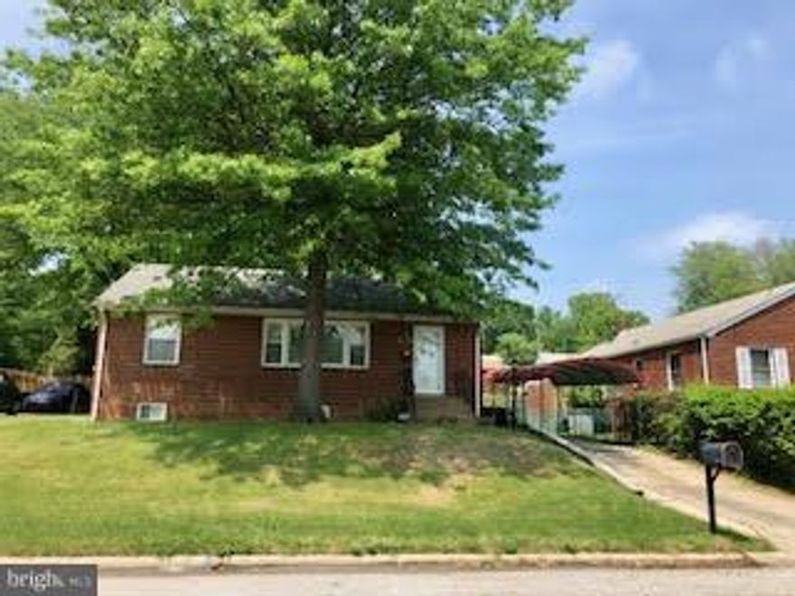 Nestled on this gorgeous lot may be your new home!  Gleaming hardwood flooring, stainless steel appliances, granite counter tops, maple cabinets & ceramic tile. One of the main level bedrooms has been converted to the current dining room but it's your choice!  1 bd and full bathroom with tub in the basement. Beautifully manicured rear yard, fully fenced for private events! *1,000 flooring credit*