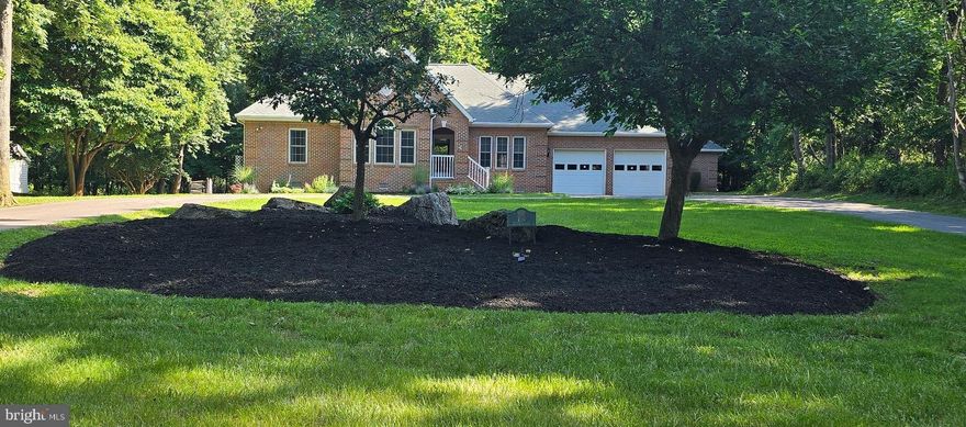 Welcome to the home of your dreams, nestled in the heart of Arden Nollville Rd in the sought after beautiful development of Tabler Estates,this home  features a main house with three bedroom, two baths and an in-law suite with two bedrooms and one bath,  each showcasing  their own Kitchen, Living Room, and Laundry Room. This home possesses many upgrades, including but not limited to ;  hardwood floors throughout most of the house,  refinished in 2024, ceiling fans in most rooms ,two new hot water heaters that service each unit separately, as well as water treatment systems, replaced in 2023,  a beautiful modern  kitchen with all stainless appliances and granite countertops, upgraded in 2023, along with dual fueled six burner stove with double oven, new carpet in primary bedroom, a new HVAC in the in-law suite was replaced in 2024, all steel screens on all windows on both sides brought up  to date in 2024, all new smoke detectors and carbon monoxide detectors were also replaced, the septic tank was pumped on 4/4/24.
    A  large two stall garage with a circle drive leads you to this stunning professional  expansive landscaped , all brick rancher.  As you walk  through the entryway,   a  custom bookcase with dry bar  in the living room creates almost a serene feeling with high ceilings and a gas fireplace, so many possibilities for someone needing a lot of space, pocket doors are in most of the main areas with beautiful crown molding framing  the walls, .  Walking outside onto the massive deck with an enclosed screened in section is breathtaking ,picture yourself watching the deer prance through your park like , fenced in backyard while relaxing in the hottub.

Keep in mind, if you do not need the extra space with the In-Law Suite, it could easily be rented out separately to off set your mortgage.  This would be a great investment no matter how you decide to use it.

Call to set up a showing today.