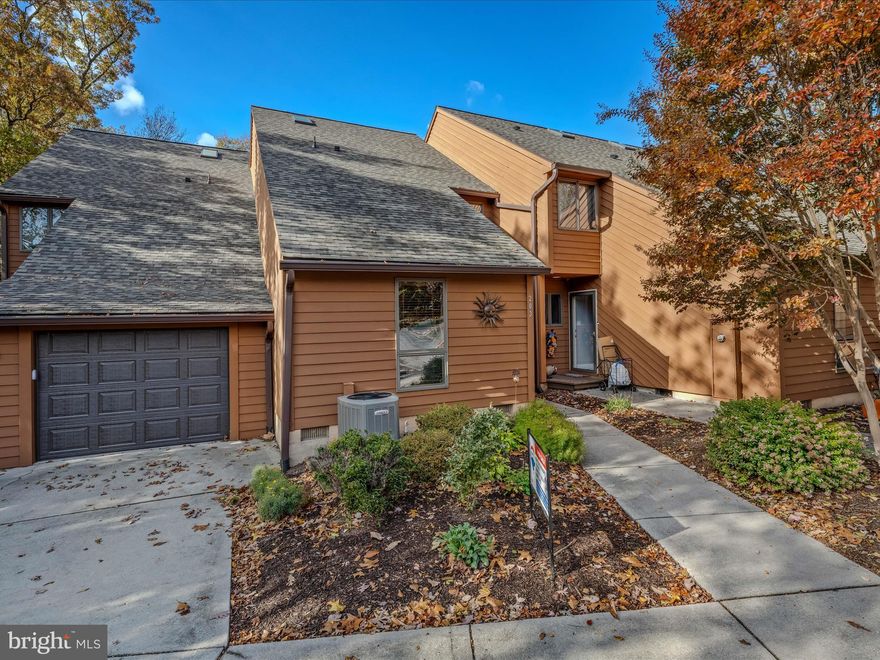 This beautifully maintained townhome is situated in the much sought after The Woods community. The home features 3 levels of living space including 3 bedrooms and 4 full bathrooms. The property comes fully furnished and presently has a Class B membership with The Woods Resort. You enter the home in the foyer with hardwood floors. To your right is a cozy kitchen with ample cabinet and countertop space. The passthrough is open to the dining space. The hardwood floors carry through the main floor of the home. The dining room and living rooms are open to each other. This is a great set up for entertaining. A lovely, decorative light fixture defines the dining space. The spacious living room features vaulted ceilings and a gas fireplace to cozy up to in the coming winter months. A sliding glass door leads out to the balcony with beautiful views. Bedroom 1 is on the main level of the home. It features carpet, vaulted ceilings and ample closet space. There is also a full bath on this level with single bowl vanity and walk-in shower. Upstairs bedroom 2 is a junior suite with carpet and vaulted ceilings. The ensuite features a single bowl vanity for storage and a walk-in shower. The primary suite features vaulted ceilings and a private balcony with beautiful views. Your suite also includes a large walk-in closet and ensuite bathroom. Your private ensuite features a single bowl vanity for storage, a walk-in shower and large soaking tub. You will want for nothing in this space. The lower level of the property is a large family room with tons of natural light. This is a great space to gather with friends and family. The sliding glass door leads to the rear patio. The lower level includes a full bath with single bowl vanity and walk-in shower. There is also a large storage room on this level. Between this and the two outside closets you have more than enough storage. This home has everything you want and need. Schedule your showing today!