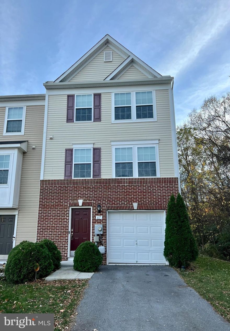 IMMEDIATE MOVE IN AVAILABLE! Welcome to this move-in ready end unit townhome in Stonebrook Village! Recently painted and impeccably cleaned, this townhome is ready to welcome its next tenant with open arms. Boasting 3 bedrooms and 2-1/2 bathrooms, this home offers spacious and comfortable living. The open and bright main level is perfect for entertaining, with a seamless flow from the living area to the fully equipped kitchen. The upper level features an over sized master suite with a private en-suite bathroom and walk in closet, along with two additional bedrooms and another full bathroom. With three finished levels, including a versatile rec room, you'll have plenty of space for all your needs. Outside, enjoy the  benefit of being an end unit with a side and back yard. This home also has a one car garage, adding convenience and functionality to your daily life. Close to schools, shopping, dining, and commuter routes. Don't miss out on this townhome, schedule a showing today and move right in. All applications through Zillow.