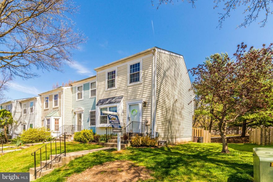 End unit gem walking distance to water!  Too many updates to mention- roof, windows, baths, hvac, paint and carpet, basement tile, doors.  Recently refinished deck over fully fenced walk out lower level.  Upstairs laundry, large bedrooms.  5 minutes to 270, numerous ways south.  Pools, tennis courts, gym, walking trails all included in community fee!.  Light, bright, and move in ready!