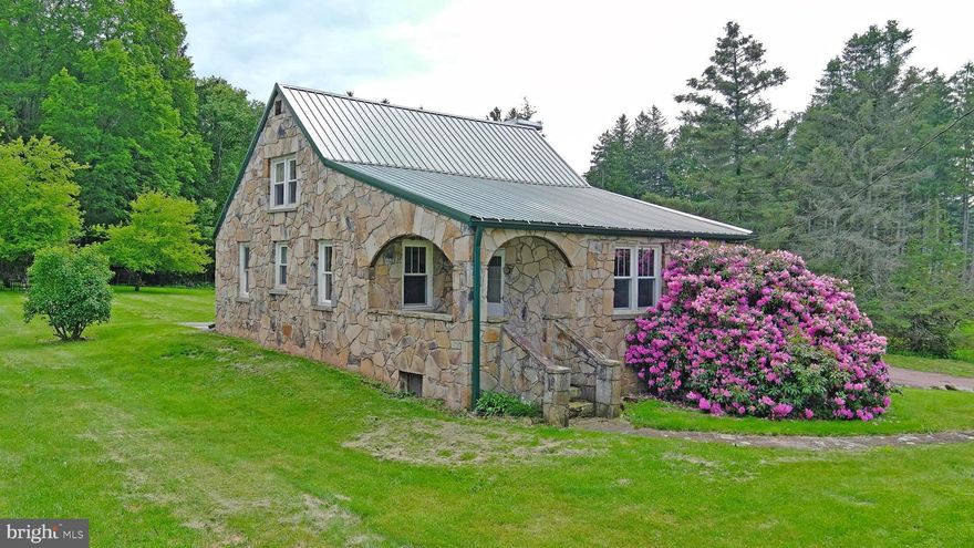 Charming 4-bedroom, 1.5-bath stone home situated on a level lot on the outskirts of the quaint town of Accident, MD. This well-built home features a spacious layout, full unfinished basement, and public utilities. Recent updates include a durable metal roof, modern laminate flooring, and upgraded electrical. Enjoy outdoor living with a covered front porch, rear patio, and large yard—perfect for relaxing or entertaining. A detached 1-car garage provides additional storage and convenience. A solid opportunity with small-town charm and modern improvements.