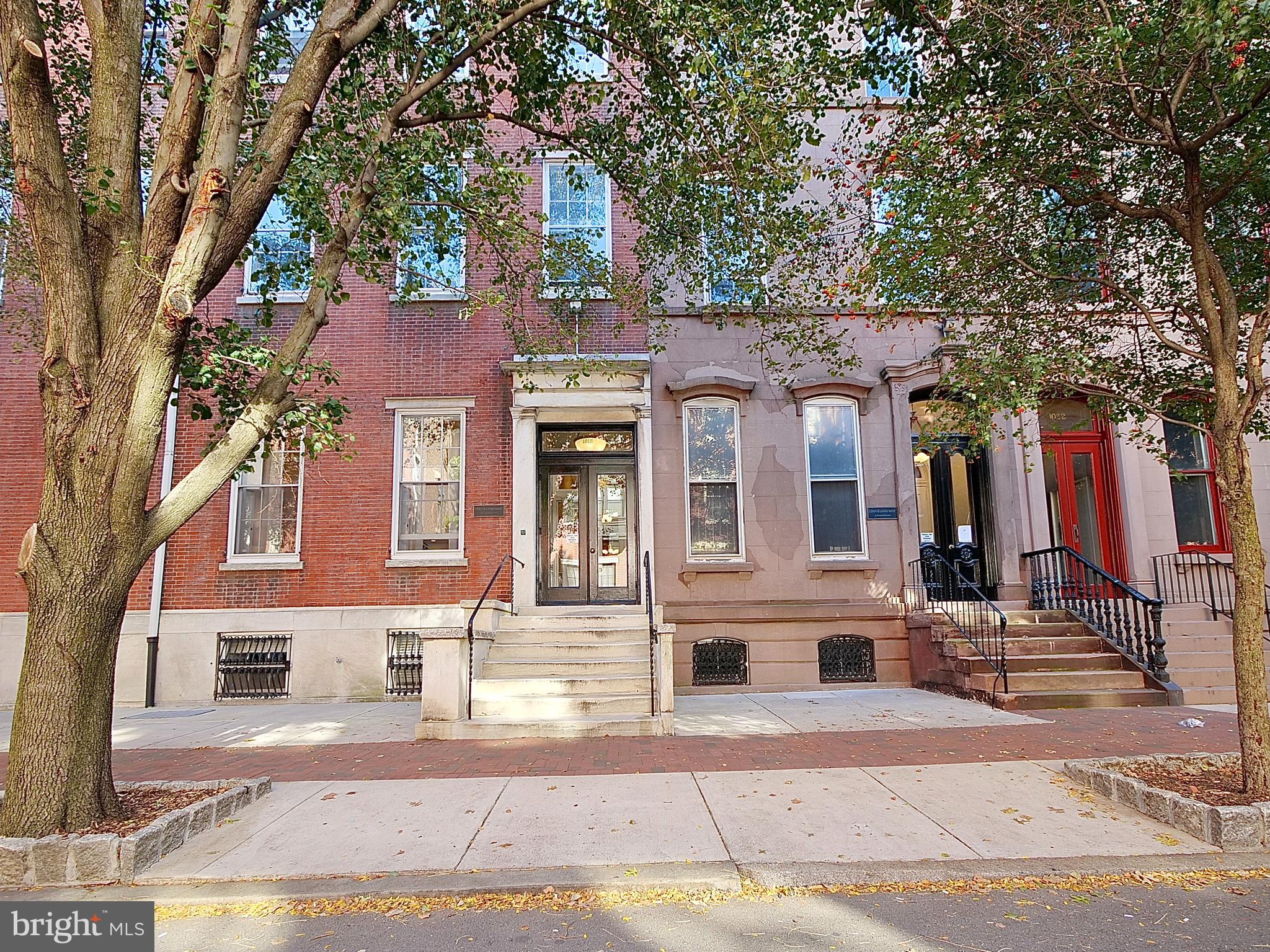 Welcome to the historic Strickland Row Condominium. Step into this lovely array of buildings surrounded by manicured courtyards, an in ground pool & nestled on a tree lined street in the beautiful Washington Square West/Queen Village neighborhood. There you will find 1018 Spruce St. Unit 2R. Completely remodeled top to bottom in 2020 with high end appliances to include a refrigerator, gas stove/oven, microwave, dishwasher& garbage disposal as well as a full sized washer & dryer. This condo is located in the back of the building with stunning views of the courtyard and pool from the large bay windows in both the living & bedroom and remodeled to make the most use of space & convenience. As you walk into the front door you are greeted by a spacious closet. The entrance leads you to an open wide living/ dining room combo with decorative fireplace. This unit boasts 12.5 foot ceilings with recessed lighting and flooded by natural light coming from the many windows looking over the beautiful courtyard & pool. Kitchen has been equipped with state of the art appliances with plenty of counter space for food prep and cabinets for storage. Walk past the spacious dining area into the living room and down the hall to a beautifully remodeled bath with extra large cabinet with anti-fog mirror and linen closet right across the hall. Continue down the hall into the master bedroom with walk-in closet, full sized washer & dryer and extra over the closet storage. Space, Light & Elegance are the words that come to mind when describing this beautiful condo flooded with natural light. There are two ceiling fans with remote as well as a remote controlled retractable blind. Hardwood floors have been refinished and the condo has been painted and meticulously maintained by the owners. Courtyards, Rooftop Deck & a Seasonal In-ground Pool are also part of the benefits of living in Strickland Row. There is a large public laundry located in one of the buildings and an area to house your BBQ Grill and Bicycle(s) for a small additional fee. Walk out onto Spruce and into all that Philadelphia has to offer. Restaurants, shops and bars are all within walking distance. As if the aforementioned features aren't enough to make you want to move in right away, the $2500. per month rent includes All Utilities. (Gas, Water, Trash, AC, Heat, Snow/Ice Removal, Electric) Electric is typically $40 per month which is well within the $100. cap on electric usage, tenant is responsible for any electric usage over $100 per month to exclude Air Conditioning and Heating which have unlimited usage. Average use is approximately $40 per month. Make your appointment today. This one will NOT last in this area and at this price! The owners have put together an informative brochure for potential renters that includes the condominium rules and is available for your review.