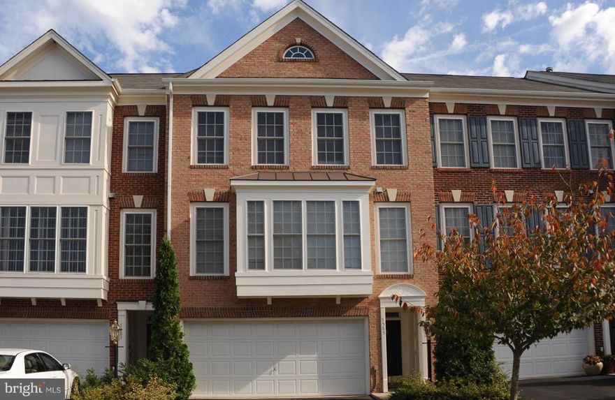 Welcome to 7585 Grey Goose Way, a gorgeous brick-front Fenwicke model backing to trees in Alexandria's Grove at Huntley Meadows. This fine townhome has 3 bedrooms, 3.5 baths and a spacious 2-car garage. Elegant crown molding flows throughout the foyer, living room and dining room. Three large Palladian windows flood the living room with natural light. Off the living room is access to an expansive deck overlooking trees. The distinct dining area is highlighted by chair rail and a stylish light fixture. The spacious eat-in kitchen features recessed lighting, a modern light fixture, a deep double sink and 42-inch cabinets with crown molding. The owner's bedroom features French doors, a cathedral ceiling with a fan, a roomy walk-in closet and lots of windows. Deluxe and appealing, the owner's bath includes a separate shower, a Jacuzzi soaking tub with a window view of trees, dual sinks, French doors and a vaulted ceiling. A convenient laundry area is located on the bedroom level along with a full bath in the hall. The second and third bedrooms each have two windows. The lower level features a rec room with an inviting fireplace, a third full bath, and a door leading out to a fenced-in back yard. Be sure to take advantage of the community pool and tot lot. This home is in a great location near all major transportation routes, Old Town Alexandria and Fort Belvoir. 1 small pet under 40 pounds will be considered with a $500 pet deposit. Minimum income to qualify is $136,000. Freshly painted and new carpet.