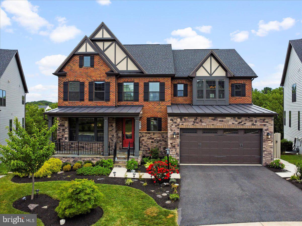 Welcome to Lake Linganore’s Oakdale Village—where timeless design meets resort‑style living. This stunning craftsman‑style home offers over 4,200 square feet of beautifully designed space, filled with thoughtful details and luxurious finishes throughout. The main level showcases a bright, open layout that flows effortlessly from room to room. A formal dining room and living room set the stage for elegant entertaining, while the gourmet kitchen is the heart of the home—complete with an upgraded appliance package featuring a gas cooktop, oversized refrigerator, and two convection wall ovens. The kitchen is also home to a large island with a breakfast bar featuring upgraded quartz countertops and antique brushed raised-panel cabinets. Just off the kitchen, the breakfast nook opens to a large covered composite deck, perfect for relaxing or hosting gatherings. Additional highlights include an arrival station with built‑ins, a spacious walk‑in pantry, a private office, and a convenient half bath. On the upper level, the expansive primary suite is a true retreat, featuring tray ceilings, two walk‑in closets with custom organization systems, and a spa‑like primary bath with granite counters, double sinks, an oversized shower, and a separate soaking tub. Three additional bedrooms complete the upper level, each with its own walk‑in closet and direct access to a full bathroom—a rare and coveted feature that provides comfort and privacy for everyone. On the lower level, you’ll find a sprawling recreation room with sliding door access to the concrete patio and fenced backyard, creating seamless indoor‑outdoor living. This level also offers a full bathroom, an unfinished utility room with abundant storage, and another unfinished room with an egress window—ideal for a future fifth bedroom or hobby space. Living in Oakdale Village at Lake Linganore means enjoying an unmatched community lifestyle with private beaches, a sparkling pool, scenic trails, sports courts, tot lots, playgrounds, and so much more. If you’ve been searching for a home that blends luxury, functionality, and resort‑style amenities, look no further—schedule your private tour of this exceptional property today and experience the Lake Linganore lifestyle for yourself!