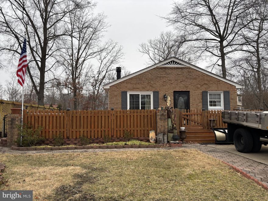 Welcome to your private retreat in the heart of the highly sought-after Lake Ridge community! Situated on a spacious, fenced, cul de sac lot, this beautiful home offers the perfect blend of comfort, charm, and convenience. Enjoy outdoor living at its finest with a wrap-around deck, storage shed, and plenty of room to roam. Inside, you’ll find gleaming hardwood floors throughout the main level, an eat-in kitchen with granite countertops, and a sun-filled living space that’s perfect for relaxing or entertaining.

The main level features a large primary bedroom with ensuite, plus two additional generously sized bedrooms and a full bathroom. The finished walk-up basement adds even more living space with a cozy recreation room complete with a wood-burning stove, an updated full bathroom, an additional bedroom, and plenty of storage.

Located in the premier Lake Ridge community, residents enjoy access to 5 swimming pools, sports courts, miles of scenic trails, community centers, a boat ramp, and a variety of clubs and classes for all ages.

Commuters will love the easy access to the commuter lot, public transportation, and major routes—plus you're just minutes from shopping, dining, and entertainment. All of this in an area served by top-rated schools!

MUST SEE!

** Accepting Back up Offers**