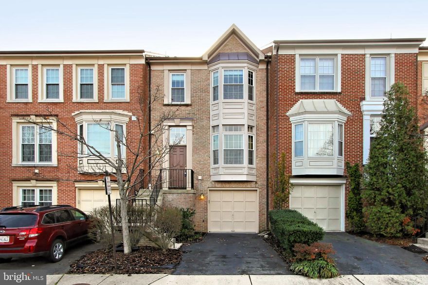 Lovely and spacious home in wonderful Kingstowne community.  Beautiful hardwood floors greet you at the gracious entry.  Separate living & dining rooms plus a large eat-in kitchen with walkout to Deck as well as a coat closet and powder room on the main level. Upper level has a primary suite with vaulted ceilings and en suite bath with double vanity, soaking tub and skylight. Two additional bedrooms and full bath complete this level. Lower level has large family room with 2nd fireplace, 3rd full bath, walkout to fenced yard, garage access and lots of storage.  Beautiful finishes throughout! Kingstowne amenities!