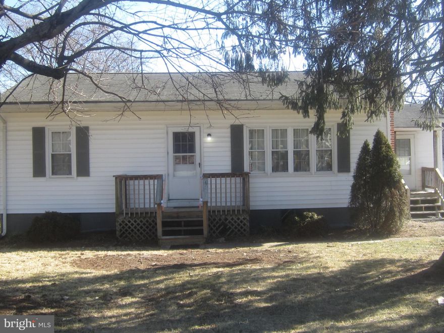 Own for less than rent. Charming bungalow close to the interstate, shopping and schools. 2 bedroom 1 bath cozy home with wood floors. Wonderful starter or down sizing home. Large backyard with plenty of room to roam.  Deck overlooking backyard. Plenty of room to add a garage.