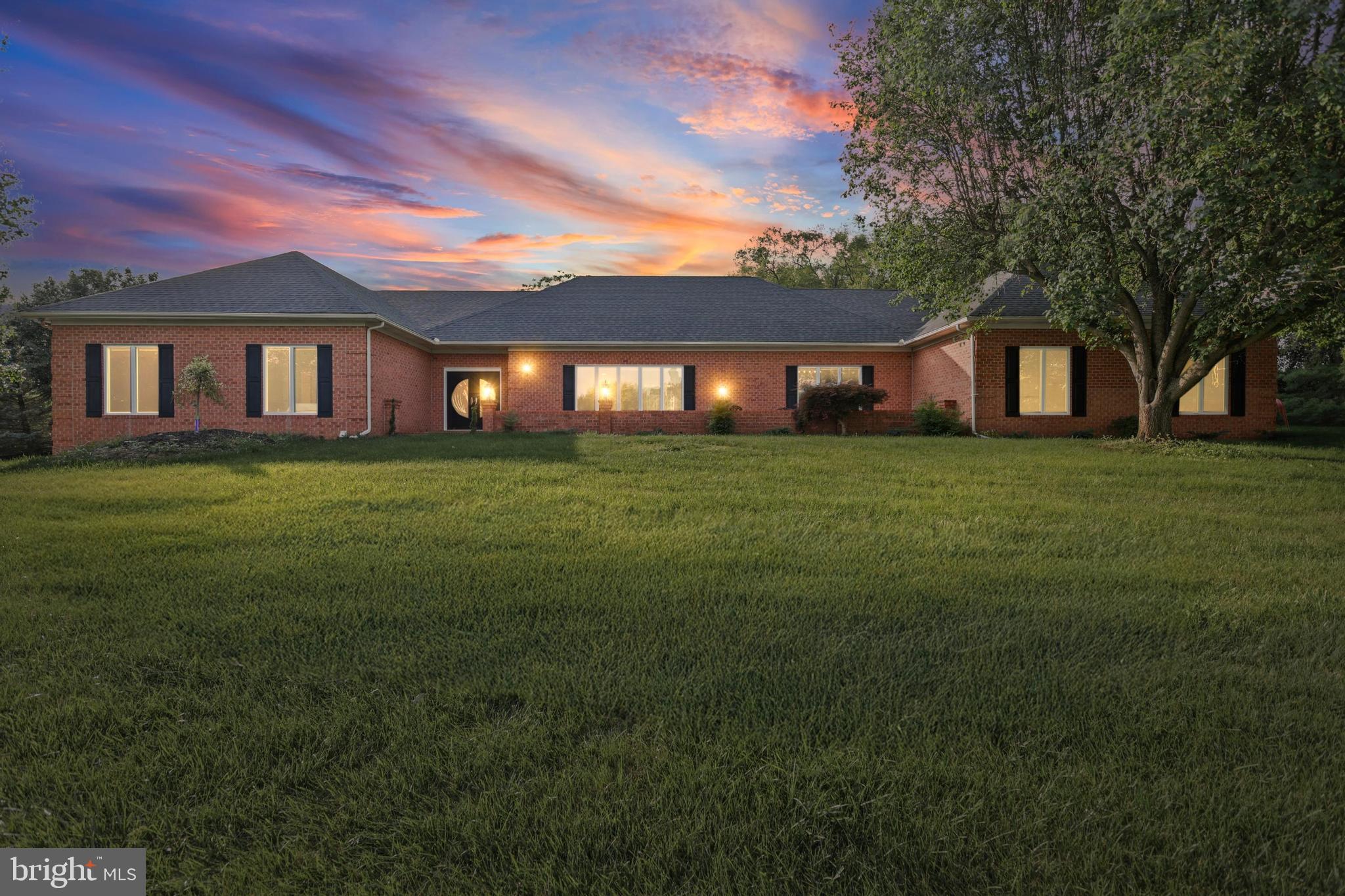 Luxury Ranch-Style Living! Welcome to 726 Weil Mandel Way—an exceptional and rare find in the highly sought-after Shawan at Hunt Valley community. Nestled on a private 3.87-acre lot, this expansive 7,638 sq ft ranch-style home has been fully remodeled in 2025 including new roof and offers the perfect blend of elegance, space, and comfort. From the moment you arrive, you'll be captivated by the property’s peaceful surroundings, elegant brick exterior, and meticulous updates throughout. Inside, the home features a bright open-concept floor plan, ideal for both entertaining and everyday living. The heart of the home is the gourmet kitchen, fully outfitted with high-end Viking 6-burner gas stove, oversized island, custom cabinetry, and granite countertops. Adjacent to the kitchen, the formal dining area and spacious living room with hardwood floors create a warm, welcoming atmosphere. This home offers 7 spacious bedrooms and 5.5 beautifully updated bathrooms, providing ample room for family, guests, or multigenerational living. The primary suite is a luxurious retreat, featuring a spa-inspired en suite bath with dual vanities, a soaking tub, and walk-in shower. The fully finished lower level is a standout feature, offering a complete in-law apartment with a private entrance, kitchenette, full bath, and separate living space—perfect for extended family or guests. The home also boasts a 3-car attached garage with plenty of storage, Main floor laundry room for added convenience, Beautiful hardwood flooring throughout the main level, Expansive basement perfect for entertaining. Located just minutes from Hunt Valley Town Centre, I-83, Oregon Ridge Park, golf courses, and top-rated Baltimore County schools, this home delivers luxury and location. Whether you're looking for peace and privacy or access to nearby amenities, this property offers it all. Don't miss your chance to own this exceptional home in one of Hunt Valley’s most prestigious communities. Schedule your private showing today!