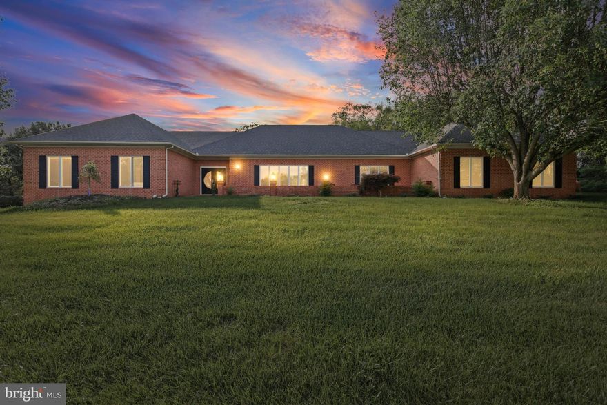 Luxury Ranch-Style Living!   Welcome to 726 Weil Mandel Way—an exceptional and rare find in the highly sought-after Shawan at Hunt Valley community. Nestled on a private 3.87-acre lot, this expansive 7,638 sq ft ranch-style home has been fully remodeled in 2025 including new roof and offers the perfect blend of elegance, space, and comfort. From the moment you arrive, you'll be captivated by the property’s peaceful surroundings, elegant brick exterior, and meticulous updates throughout. Inside, the home features a bright open-concept floor plan, ideal for both entertaining and everyday living. The heart of the home is the gourmet kitchen, fully outfitted with high-end Viking 6-burner gas stove, oversized island, custom cabinetry, and granite countertops. Adjacent to the kitchen, the formal dining area and spacious living room with hardwood floors create a warm, welcoming atmosphere. This home offers 7 spacious bedrooms and 5.5 beautifully updated bathrooms, providing ample room for family, guests, or multigenerational living. The primary suite is a luxurious retreat, featuring a spa-inspired en suite bath with dual vanities, a soaking tub, and walk-in shower. The fully finished lower level is a standout feature, offering a complete in-law apartment with a private entrance, kitchenette, full bath, and separate living space—perfect for extended family or guests. The home also boasts a 3-car attached garage with plenty of storage, Main floor laundry room for added convenience, Beautiful hardwood flooring throughout the main level, Expansive basement perfect for entertaining. Located just minutes from Hunt Valley Town Centre, I-83, Oregon Ridge Park, golf courses, and top-rated Baltimore County schools, this home delivers luxury and location. Whether you're looking for peace and privacy or access to nearby amenities, this property offers it all. Don't miss your chance to own this exceptional home in one of Hunt Valley’s most prestigious communities. Schedule your private showing today! COMES WITH 1 YEAR HOME WARRANTY