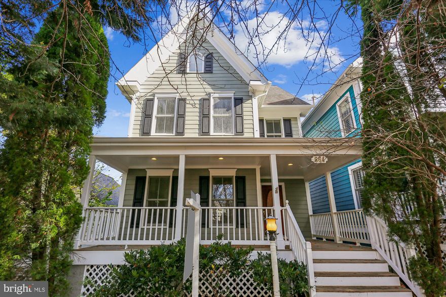 Tucked into a uniquely private mews setting, this beautifully updated home offers spacious interiors, flexible living options, and a rare detached carriage house. A picturesque front porch welcomes you inside, where hardwood flooring flows throughout the main level. The living room showcases elegant crown molding and large windows that fill the space with natural light. The family room, featuring a gas fireplace and expansive windows, adjoins both a sunny breakfast area and the kitchen, creating a natural gathering space. The kitchen includes quartz countertops, stainless steel appliances, and a convenient breakfast bar, while a stylish powder room completes the main level. Upstairs, the luxurious primary suite offers a walk-in closet and a spa-like en-suite bath with a soaking tub and separate glass-enclosed shower. Two additional spacious bedrooms share a second full bath with updated hardware and fixtures, and the third level provides another generously sized bedroom with a walk-in closet. Outdoor living is equally appealing, with a private backyard leading to the garage and carriage house—flexible space ideal for guests, a home office, hobbies, or other uses.