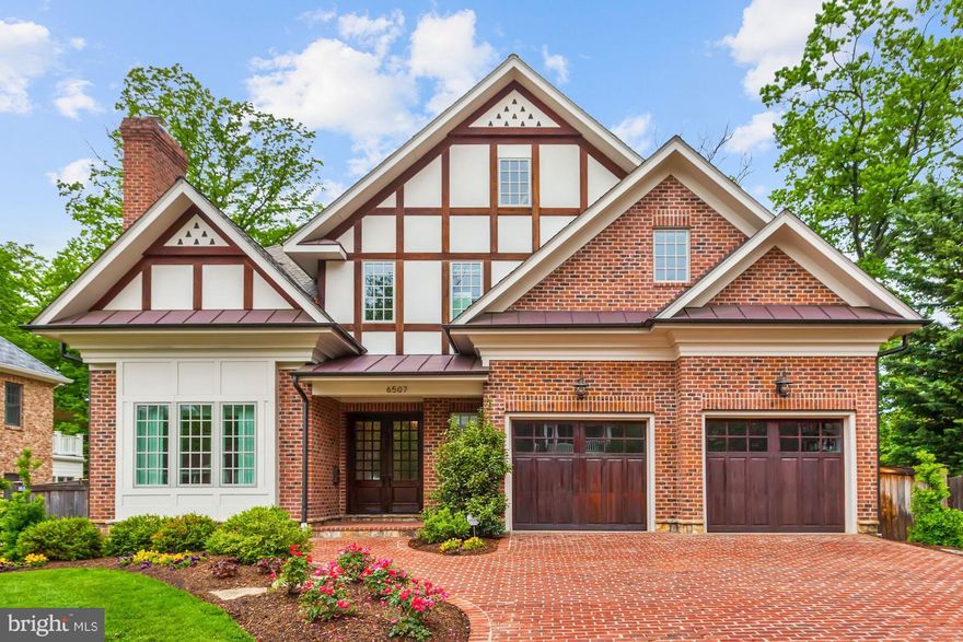 Wow - Amazing Value in North Arlington! Refreshing blend of Craftsmanship, Quality and Design!  Builder's personal home features over 8200 SF of space on 4 levels. Gourmet kitchen w/60" Wolf Range, Sub-Zero, 3 dishwashers, 10' ceilings on 3 levels, Brazilian Cherry floors & Travertine tile floors. Spa-like Master suite. Outdoor kitchen w/fridge, sink, grill & fireplace - perfect for entertaining!