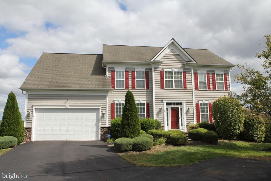 GREAT NEW PRICE: Beautifully maintained  Augustine Homes built hilltop Colonial with 4 bedrooms on the upper level including the Primary with full bath, Junior Primary with full bath and 2 more bedrooms sharing a Jack and Jill bathroom.  Lower level features a theatre space with surround sound and movie style seating plus another full bathroom and bedroom.  Gorgeous hardwood flooring on the main level along with an office and fantastic kitchen with an island opening up to the family room with a gas fireplace.  There's almost 5K sq ft of living space plus the attached 2-car garage located in a cul-de-sac on almost a 1/2 acre lot w/irrigation system .  Just off the grand entry is  the perfect home office with nearby 1/2 bath.  The awesome kitchen features natural gas cooking, double wall ovens, granite counters, an island with seating and a nice sized breakfast area plus 2 pantries!  Enjoy morning coffee and  BBQing on the sunroom overlooking the Hills of Aquia or cozy up to the gas fireplace in the family room and watch your favorite shows and sports .  This home has many custom touches throughout and reflects the owners tasteful touches making it move-in ready and has an assumable VA loan at 2.25%!