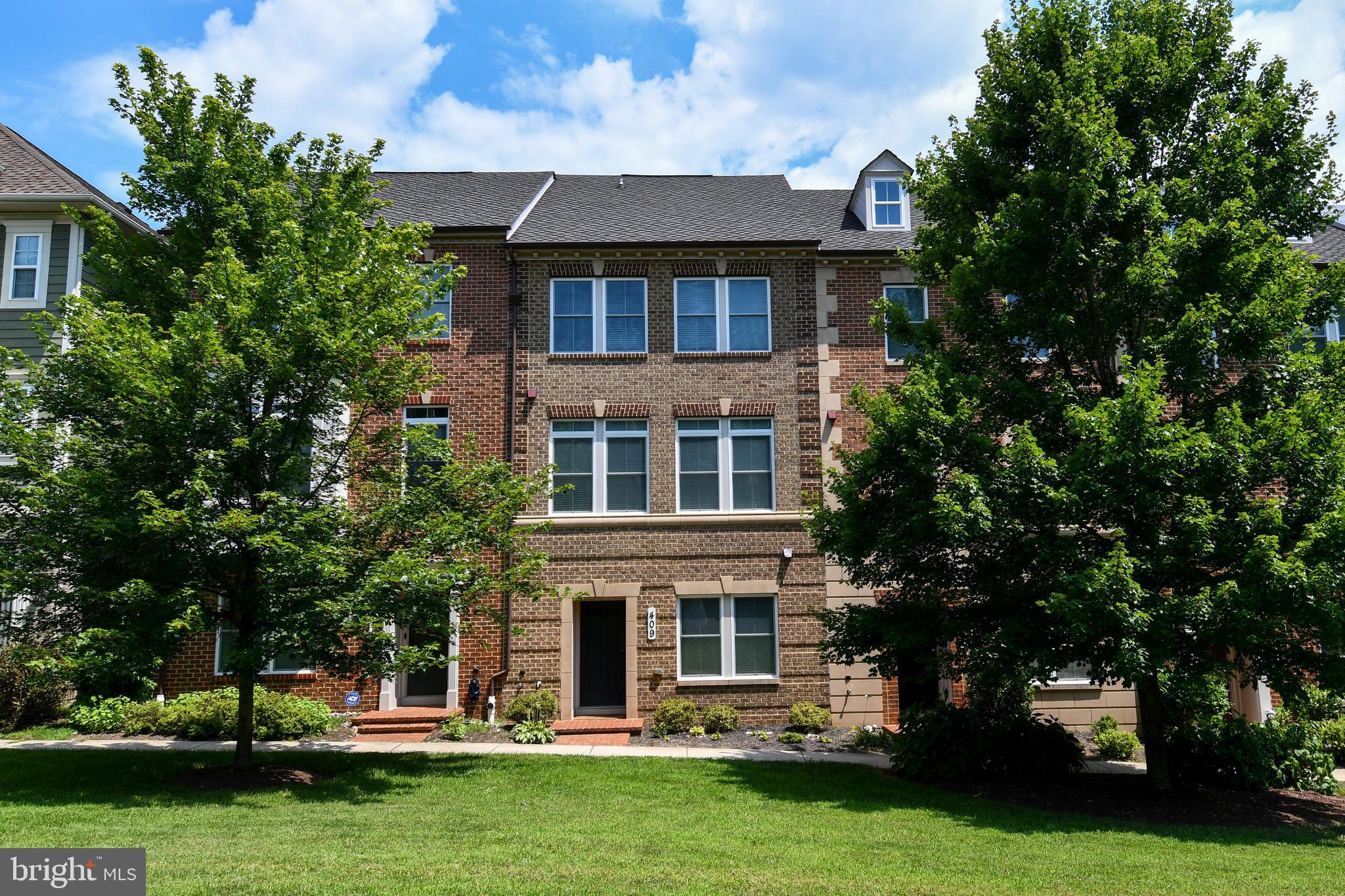 Welcome to this beautifully maintained and light-filled 4-level Vanderbilt townhome in the sought-after Parklands at Watkins Mill community. Offering nearly 2,800 sq ft of luxurious living space, this home blends comfort, flexibility, and convenience — ideal for modern renters who want it all.
Step inside to find a bright and open main level, featuring gleaming hardwood floors, a gourmet kitchen with an oversized island, granite counters, stainless steel appliances, and gas cooktop. The living room is perfect for relaxing or entertaining, complete with built-in bookshelves and a cozy gas fireplace, while large windows flood the space with natural light.
Upstairs, the bedroom level features two generously sized bedrooms, a full bath, laundry area, and a spacious primary suite with two walk-in closets and a private bath with double vanities and dual shower heads.
The top floor includes a versatile bonus room or fourth bedroom, full bathroom, built-in bar, and a rooftop deck — the perfect setup for guests, entertaining, or a home office.
On the entry level, you’ll find a dedicated office or flex space, powder room, welcoming foyer, and access to a two-car attached garage.
The Parklands offers resort-style amenities: a community pool, fitness center, tennis courts, clubhouse, playgrounds, and scenic walking paths. Located just moments from Downtown Crown, the Kentlands, and the MARC station, with easy access to I-270 and Watkins Mill Interchange, this home provides unbeatable convenience while offering a peaceful, neighborhood feel.