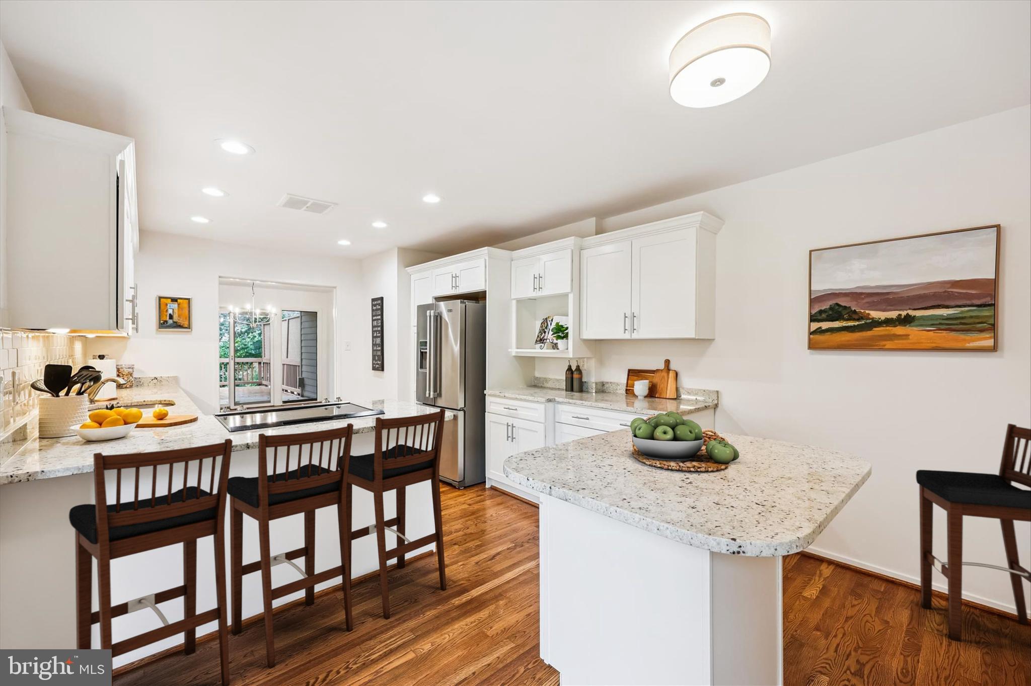 Welcome to 7818 Whiterim Terrace, located in the highly sought-after Woodrock community within the Carderock Springs/Pyle/Whitman school cluster. This beautifully renovated home features generous living spaces, with a total of 3 spacious bedrooms plus a lower-level flex room, 3.5 baths, and a one-car garage.
As you enter through the gated courtyard, perfect for kids and pets, you will be welcomed by a sunny foyer, complete with fresh paint throughout, refinished hardwood floors, new light fixtures, LED recessed lighting, new carpet, and new luxury vinyl plank flooring in the lower level.
The kitchen, renovated a few years ago, boasts custom cabinetry, stainless steel appliances, stone countertops, and a breakfast island. An updated powder room, a cozy fireplace, and sliders that lead to the oversized, gated deck invite you to enjoy the serene green views outside.
On the upper level, you'll find cathedral ceilings in the large bedrooms, a renovated full hall bath, and an expansive owner's suite that includes a sitting room/office area, a brand new walk-in closet, a cheerful balcony, and a spacious, newly designed owner's bath featuring a double-sink vanity along with a separate make-up vanity, a built-in linen cabinet, and an oversized walk-in shower with a bench.
The lower level offers new flooring, an additional fireplace, an updated full bath, a flex room that could also serve as an office or exercise room, and a separate laundry room. The roof and HVAC system have also been recently serviced. This home is truly turn-key, right down to the freshly painted garage.
Woodrock is a wonderful community located in Potomac, Maryland, just minutes from Potomac Village, I-495, Clara Barton Parkway, and Great Falls National Park. Enjoy easy access to endless hiking and scenic trails, plus you’ll be close to Old Angler's Inn and the diverse shopping and dining options available in Potomac Village.