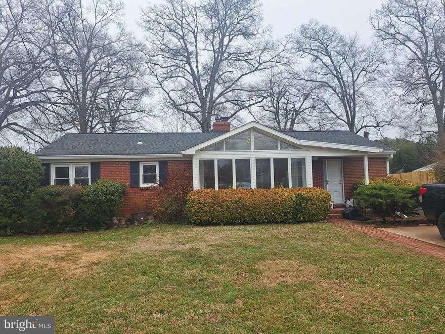 This home is a true SHOWSTOPPER! Welcome to this beautifully updated, approximately 1,800 sq ft home featuring 3 bedrooms, a versatile bonus flex room, and 2 fully renovated bathrooms.  The large bay windows fill the home with abundant natural light, creating a bright and inviting atmosphere. The stunning kitchen features high-end appliances and ample custom 42-inch soft-close cabinetry, offering both style and functionality.  Enjoy the spacious bathrooms with elegant custom tile work, brand-new LVP flooring throughout, and glamorous modern light fixtures.  Conveniently located near plenty of shopping, dining, and just minutes from Fort Belvoir—this home truly has it all. Welcome home!