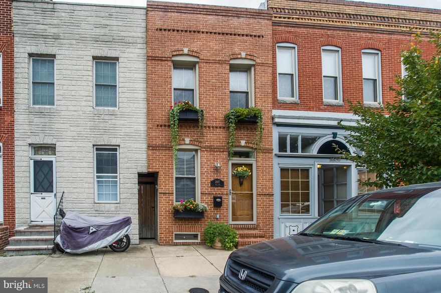 Gorgeous renovation in a prime location! This beautifully maintained 2 BR/2BA features a open floor plan w/ granite counters, SS appliances, exposed brick, hardwood floors, open riser stairs, laundry on upper level, brand new roof & plenty of storage in the basement. The private patio is perfect for BBQs. Just a short walk to Safeway, Canton Sq., the waterfront promenade, Fells Point & Patt Park.