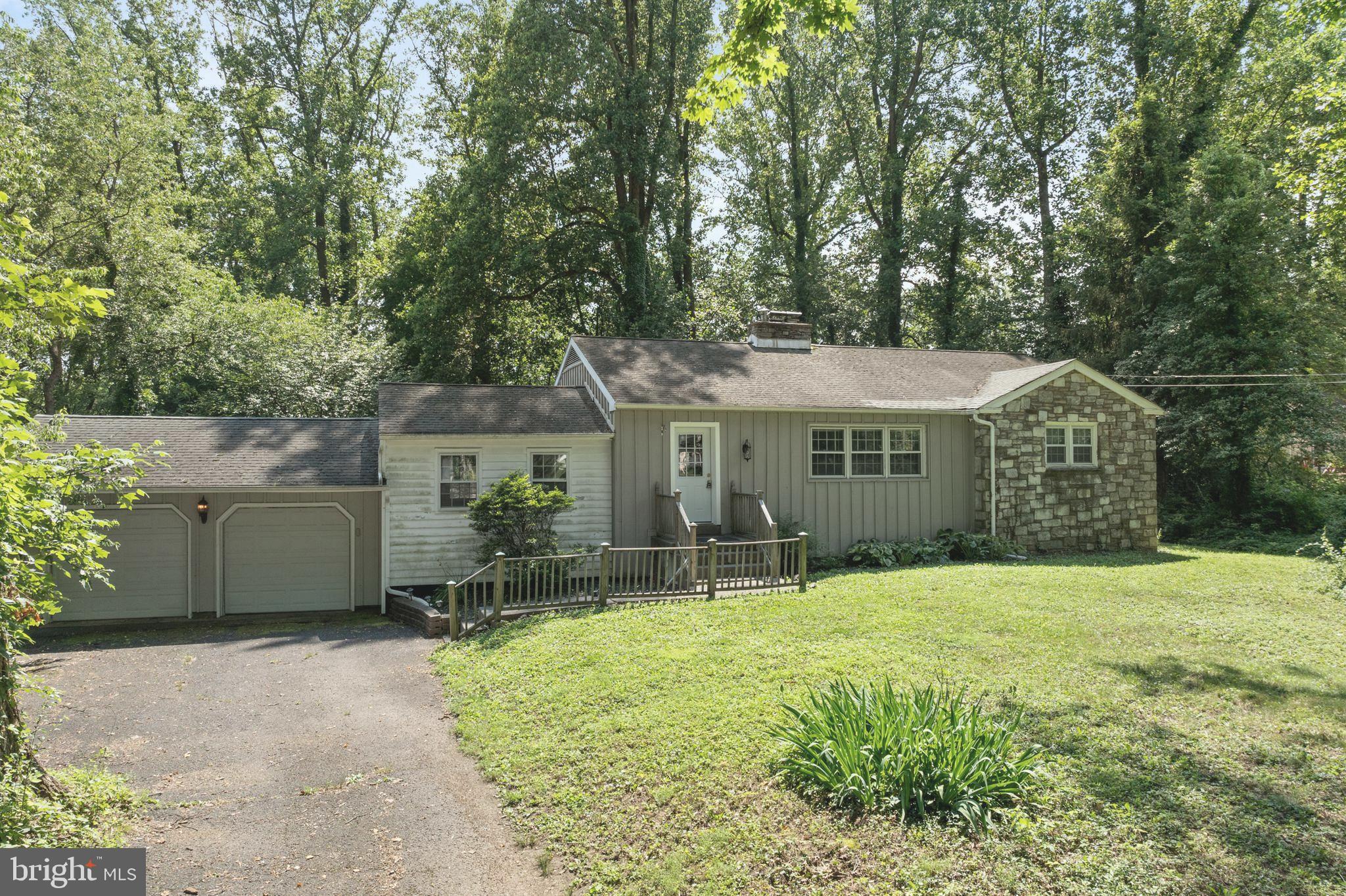 Looking for one floor living?? Youmay have just found it !!!Cute as a button, best describes this rustic rancher nestled on a wooded lot that is just over an acre.
It is located in the heart of Warrington Township and also the Central Bucks school system.
It has been tastefully updated and features modern amenities with old world warmth and charm.
You will feel the warmth the minute you enter the living room with sparkling hardwood floors and a cozy wood burning fireplace for those cold winter nights. Immediately behind the living room is the remodeled kitchen with appealing Cherry cabinets, granite counter tops, ceramic tile floor and high-end stainless-steel Samsung appliances.
The entire first floor glows with warm hardwood floors. There are three bedrooms all of ample size and a newer full bath. The master bath has a convenient powder room.
Imagine yourself hosting great holiday meals in 15x15 dining room again with hardwood floors and built-in bookshelves. Lots of room for a large table and server.
Dad will just love the oversized two car garage. It has plenty of room for your cars, tools and workspace.
The rear lot is massive with mature shade trees. Just see yourself having a family barbecue on the rear patio and sipping your favorite beverage. The children will love playing there and there’s plenty of room for Dad to make a playhouse for them or your vegetable garden .
This home is located very close to the major commuter route and the Pa. Turnpike.
Hurry out and make it your home for the summer. The seller will provide a one-year home warranty at closing.
Fast settlement possible. Being sold in as-is condition.