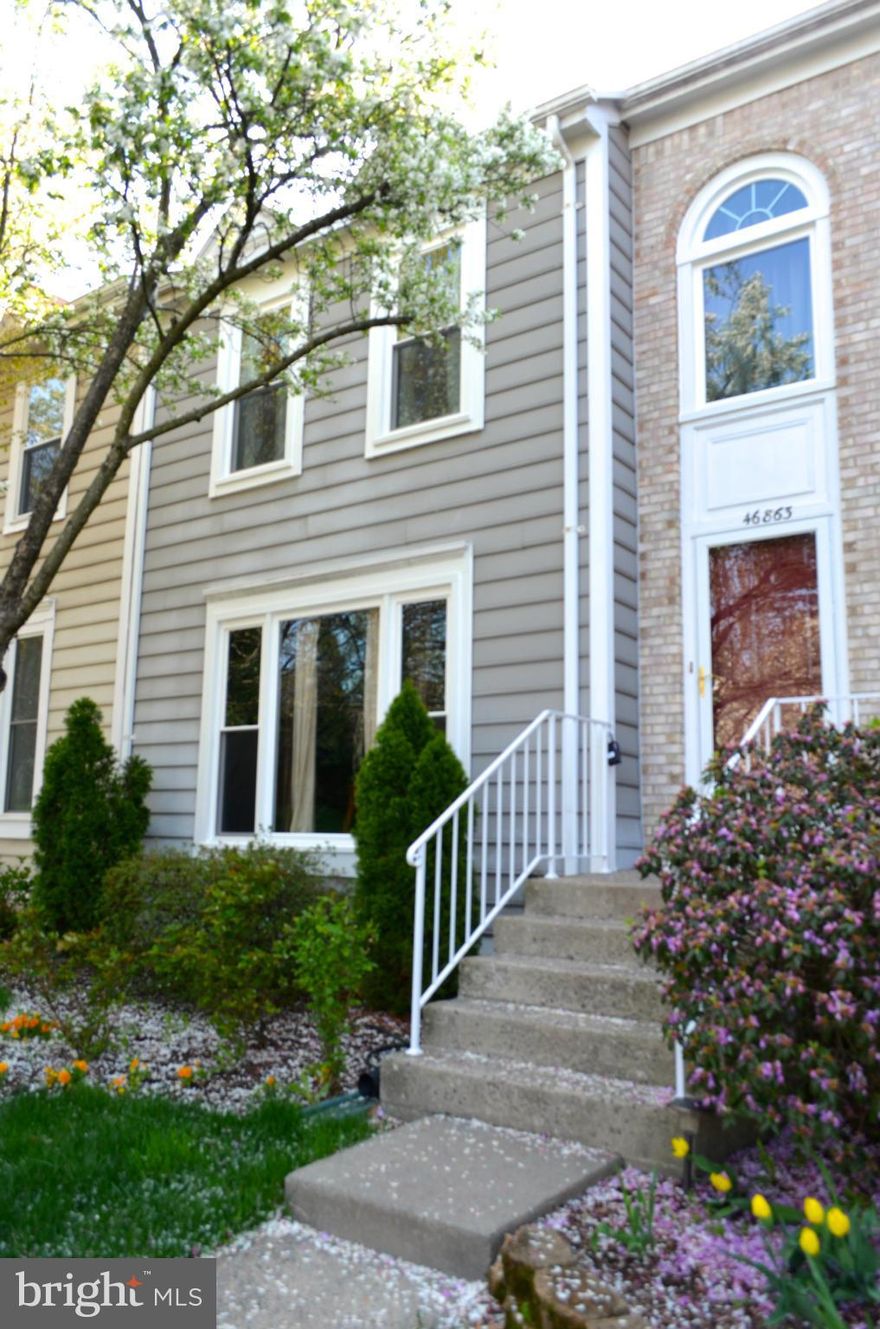 BEST VALUE IN WOODSTONE! THIS HOME IS LOCATED IN A CUL DE SAC & OFFERS 3 FINISHED LEVELS, 3 BEDROOMS, 3.5 BATHS & DEN, NEW WINDOWS W/ LIFETIME WARRANTY, GRANITE COUNTERTOPS, S/S APPLIANCES, CERAMIC & HARDWOOD FLOORING, SKY LIGHTS, PATIO W/ FENCED YARD, 2 PARKING SPACES, COMMUNITY POOL & TENNIS COURT, NEAR SHOPPING, DINING, RT. 7, 10 MINUTES TO NEW SILVER LINE METRO & HERNDON MONROE PARK AND RIDE.