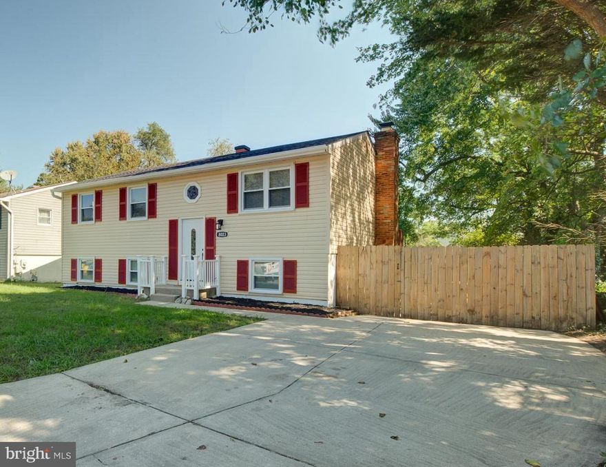 This beautiful turnkey home has been fully renovated! Big-ticket items have been upgraded like new roof, new AC, new floors, almost all new windows, new appliances, new washer/dryer, new quartz countertops with new 42" cabinets, new interior doors, fresh paint, new light fixtures, new sump pump, new garbage disposal, new beautiful mirrored closet doors, new basement ejector pump, and more.  The upstairs has 3 bedrooms and 1 full bathroom. The fully finished walk out basement hosts 1 bedroom, 1 full bath, and with a big living space. The backyard has a large deck, storage under the deck, a patio, and shed. All bathrooms have also been fully renovated. Please schedule showings online.