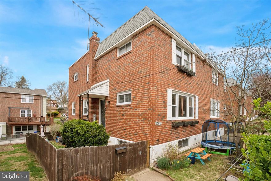 Welcome to this charming Ardmore Park brick twin home. This delightful home  features three spacious bedrooms and 1.5 bathrooms. As you step inside, you’ll be greeted by beautiful hardwood floors that extend throughout the main living areas and up to the bedrooms. The open floor plan encompasses a total of seven rooms. Large, bright open front living room, full size dining room and spacious eat-in kitchen with large island, granite countertops and stainless steel appliances.  Main floor powder room. Upstairs features the primary bedroom, 2 additional bedrooms and hall bathroom. Central air conditioning installed in 2021 and a new gas boiler 2025, ensuring comfort throughout the year. New 2025 water heater. The walk out basement level offers a finished versatile living space, laundry area and additional storage. Fenced in yard area.  One car garage. Wide driveway.  Opportunity to enjoy suburban living with easy access to local shops, dining, transportation options and parks. Close to Suburban Square, Ardmore, Wynnewood, Haverford College and Havertown.  Haverford School District.