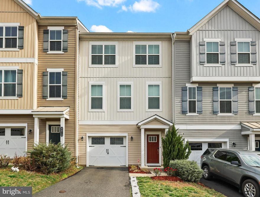 Here is the home you need and will definitely want! Welcoming first level with a room that can serve as a bedroom, an office, exercise space, etc, with a door to maximize privacy. Full bathroom attached. Main level has deep rich floors, dark cabinets, upgraded lighting, a convenient wall mounted entertainment space, and a half bathroom. The primary bedroom and ensuite will not disappoint! Laundry and two other bedrooms with generous closets finish the top floor. This one has a trex deck and patio, and an essential fenced in yard. Close to RT 1, shopping, and downtown Fredericksburg, make sure to put this one on your list of must see homes!