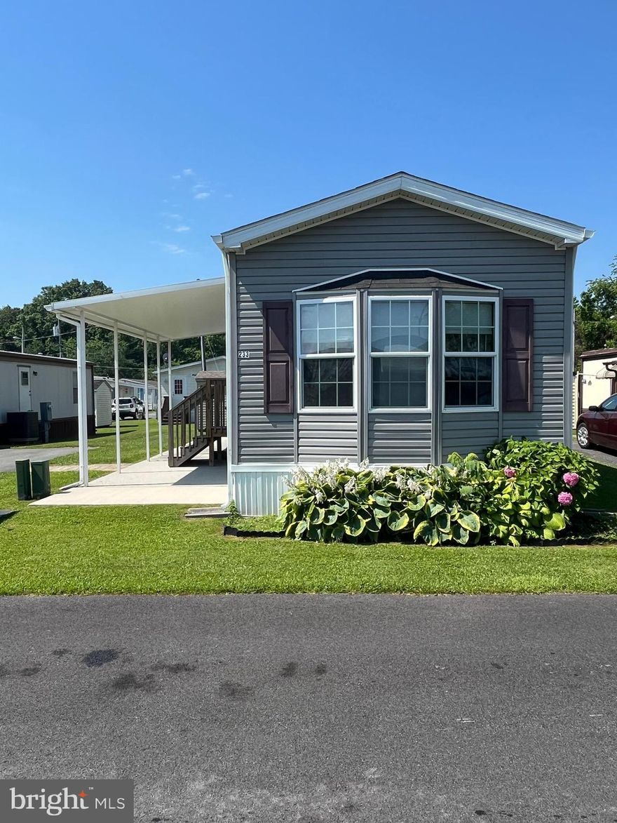 Like new 2 Bedrooms & 1 Full Bath mobile home! Located in secluded, quiet community with no through traffic. 2 car parking & snow removal included. Walk in to the open floor plan with the living room and large eat in kitchen with a pantry.  The beautiful kitchen cabinetry surrounds 3 walls of the kitchen so storage is no problem!  Walk down the hall to find your Primary bedroom with double closets and door to the full bath! There's a 2nd bedroom with a large closet and laundry area with washer & dryer just outside the bedrooms. Outside you'll find a large covered patio and shed and this home is located at the end of the street with extra parking! Not real property transfer (only personal property). Subject to park approval at the link below.  1 pet per household (50 lbs or less). Site rent subject to increase. Please see showing instructions to schedule appointments.  Home has been lovingly maintained and being sold AS IS.  Contact Briarwood Estates for park approval at jrbcommunities