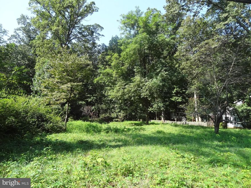 Build your dream home in the established community of Burke - A fantastic suburban location only .5  mile to Burke VRE (VA Rail Express). Enjoy close proximity to dynamic Retail Centers for groceries, retail and dining. Quality public schools nearby too.  Explore the great recreational opportunities in and around Burke including the renown Burke Lake Park/Golf Course, Lake Accotink Park, Workhouse Arts Center & so much more. Lot backs to deep dedicated green space (Burke Center) for year-round back yard privacy.  Sewer is in street for you to connect.