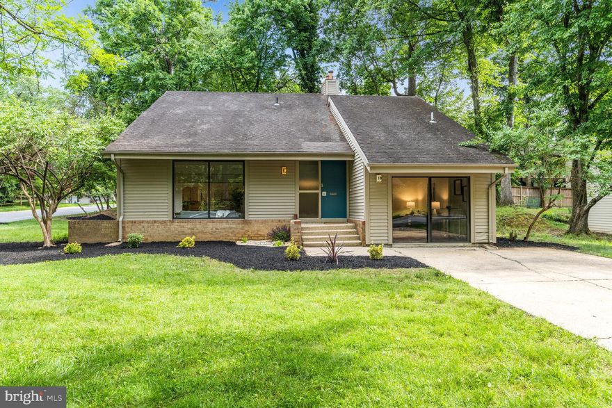 OPEN SATURDAY 5/25, 12:00-2:00PM!! 
STUNNING MID-CENTURY MODERN GEM IN SERENE NEW MARK COMMONS!
Discover the perfect blend of historic charm and contemporary living in this rare, timeless mid-century modern home nestled in the serene community of New Mark Commons in the heart of Rockville. This planned community, designed by builder Edmund Bennett and architects Keyes, Lethbridge & Condon, offers beautifully preserved natural surroundings, and a unique living experience with an array of amenities. The neighborhood's historical significance was recognized with its listing in the National Register of Historic Places in 2017.
Set on a premium cul-de-sac lot, this sparkling updated 2 level, 4BR 2.5BA home highlights an exciting open floor plan  with  soaring ceilings,  abundant natural light, and an airy living/dining area with vaulted ceilings . This gem also features a large versatile space, converted from the garage, ideal for a main level suite, home office, studio, or gym. Conveniently adjacent to this space is the laundry and storage room. An inviting family room with a fireplace and sliders to the patio, and a spacious bright kitchen with resurfaced white cabinets, view of greenery through the sink windows, and shining new appliances round out the first floor. On the second level sits the primary suite with a dual-door en-suite bathroom connecting to a second bedroom, and a hall bath shared by the 3rd and 4th bedrooms.  Stylishly renovated bathrooms and powder room, brand new stainless steel appliances,  fresh new paint throughout, professional landscaping, and lovely curb appeal make this home truly stand out!  Take advantage of the extensive community amenities, including a beautiful lake, swimming pool, 2 tennis courts, a basketball court, clubhouse, bike paths, and tot lots.  All this within just 0.5 miles from Rockville Town Center and the Metro station, or one block from the Ride On bus to Rockville Metro, and easy access to I-270, Rockville Pike, and Pike & Rose.  This beautiful home is the best value in town. Don't miss out!   ***Offers are due by 7:00pm, Sunday 5/26***