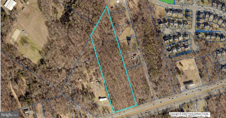 Investment opportunity: 8-acre lot on Lee Highway US 29. Highly visible with 300 feet of frontage on the north side of US-29. Located near The Shops at Stonewall (Wegmans, Bed Bath & Beyond, & Dicks Sporting Goods).

Zoning: The existing zoning of the subject is A-1 Agricultural. The subject is surrounded on the northwest and east by R4 zoning, it seems reasonable to assume that the County would look favorably on rezoning the subject to R4. R4 allows low-to-moderate density residential uses at approximately four dwelling units per acre.

Comprehensive Plan: Residential Neighborhood T-2 are and opportunity to develop single family detached homes in a residential community.  RN-2 areas primarily accommodate single-family homes arranged in a cluster or medium sized lots.  Connections and pedestrian amenities should be a priority for all development design including trails and open space integrated in the development in appropriate locations.

Best Use: The subject is located on a highway corridor ripe for development of vacant parcels into higher-density residential and commercial uses. With the almost insatiable demand for raw land available for new home construction, the rising demographics of the surrounding neighborhood, as well as the limitations imposed by the zoning requirements, in my opinion, the highest and best use of the subject is for holding as an investment, until the site can be assembled with the adjacent vacant properties. The subject is right in the path of development coming from the east and west along Lee Hwy.

Location: This parcel contains 8 acres along the north side of Lee Highway north of the Lake Manassas Planned Community and just west of the Hopewell’s Landing subdivision. The property is located in the western portion of Prince William County approximately one-half mile west of Gainesville, three miles south of Haymarket, and two+- miles west of I-66. Washington, DC is approximately 30 miles to the east of the subject property. The area contains a broad mix of residential and commercial/retail, religious, recreational, and municipal uses, varying from low to medium-density neighborhoods, with ages of construction typically between new and 30 years in the area. New construction is in evidence in all use categories as the population continues its growth throughout the County. GPIN: 7297-72-6513.