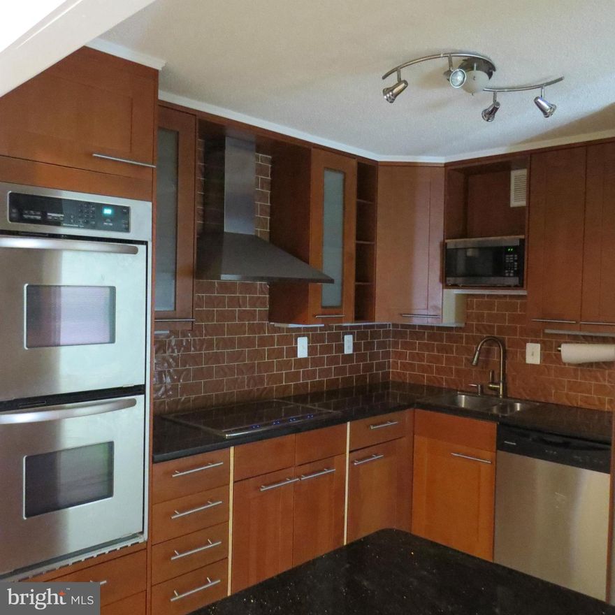 Renovated Kitchen and Bath with Garage Parking and Wood Floors! Ready for Immediate occupancy. Resort Style Living with all utilities included. 36 Gated acres, indoor/outdoor tennis & pools, shuttle to Metro, jog path, gym, library, billiards, sauna, restaurant/conv store & much more. Great location "inside the beltway" minutes to Pentagon & DC, Restaurants and Shopping.