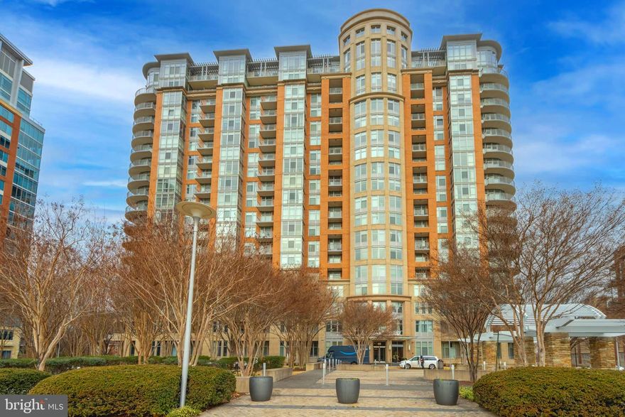 Rare, Spacious, Sun-drenched 3rd Floor,  Fully Upgraded 2 Bedroom 2 Bath Unit on the quieter outer West side of luxury One Park Crest condominium in Mclean with more than 100k in upgardes. Luxurious 2 Bedroom + 2 Bath Condo in Tyson's Corner with almost 1400 sqft of living space. Step into urban sophistication with this exquisite 2 bedroom,2 bath luxury condo in the heart of Tyson's Corner. 2 Reserved Parking spots in garage and one Storage Unit. Boasting Stunning engineered hardwood floors that gleam under the natural light, this residence offers a blend of style, comfort, and convenience. The open-concept kitchen is a culinary dream, featuring contemporary modern cabinets, stainless steel appliances, one of kind stunning piece of Granite counter top and ample counter space for your inner chef to flourish. Whether you're preparing a quiet dinner for two or hosting a soirée, this kitchen is up to the task. This unit stands out as one of the largest 2 bedroom models in the building, offering plenty of room for relaxation and productivity . Two Seperate Bedrooms with Attached fully renovated Bathrooms and custome Closets. Experience peace of mind with round-the-clock concierge and security services, ensuring your comfort and safety in this exclusive residence. Enjoy the sunsets and Breathtaking views from the warmth of the living room in cold, wet weather and from the Balcony in drier, warmer weather. 74 square feet of Balcony space, vertical view of the sky and stars. perfect for unwinding after a long day or sipping morning coffee while soaking in the serene atmosphere. Indulge in the lifestyle you deserve with access to a plethora of amenities, including a party room for entertaining, a sparkling swimming pool for those sunny days, a billiard room for friendly competition, a library for quiet moments, and convenient garage parking. This condo offers not just a place to live but a lifestyle to savor. OPC condominium is situated in the heart of Tysons with a Harris Teeter grocery store and Starbucks within the same master association. The Boro dining-entertainment and Wholefoods are 0.6 miles away and the Capital One Performing Arts Center - Wegman's are 1 mile away. Plenty more dining and entertainment options are expected within a few square blocks in the coming years. The nearest metrorail station Tysons Corner on Silver metrorail line is 0.9 miles away. Tysons is the 11th largest employment center in the country with excellent Interstate and other highways. Tysons is situated almost in the middle of the Washington DC to Dulles International Airport corridor, about 12 miles from either destination. Don't miss your opportunity to make this Tyson's Corner gem your own. Contact us today for a private showing and experience the epitome of luxury living.