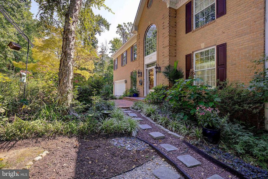 This beauty is ready for you! Recently reduced, this is a must see. Located in Annapolis Roads, a community rich in history and culture. The community is nestled between Lake Ogleton and the Chesapeake Bay. There is 30+ acres of protected green space and water. The overlook includes a playground, pavilion, a sandy beach and spectacular views of the Chesapeake and Bay Bridge.  You'll be just moments away from the best that Annapolis has to offer—charming boutiques, fine dining, historic landmarks, and the stunning Chesapeake Bay. This home truly has it all!!  Over 5,000 square ft of pure luxury.
The Open Floor Plan is Ideal for entertaining, with spacious and connected living areas.
Indoor/Outdoor Spaces: Seamless transitions between indoor and outdoor living, including a shaded, private elevated deck off the main level and a walk-out lower level.
Outdoor Amenities: Features include an outdoor shower and a screened porch off the lower-level family room, perfect for relaxing in nature. The lower level has a full bath, family room and additional bedroom, perfect for in-law suite! 
Luxurious Primary Suite: The spacious primary bedroom suite offers a designer spa-like bathroom, in-cabinet electric receptacles for a clear vanity, heated floors, and Hunter Douglas opaque powered blinds.
Gourmet Kitchen: Highlighted by a Dutch Crafters Amish-built semi-custom island made from gray painted solid maple wood with soft-close doors and drawers, a mixer lift, and a 2" hickory plank top with a soft finish. 
Lot Size: Positioned on two lots, providing over half an acre of land for privacy and outdoor enjoyment.
COMMUNITY: Water Front/Water Access Community and boat ramp
Unique community of historic Annapolis Roads
One way in/out enclave bordered by the Severn River, the Chesapeake Bay, Lake Ogleton, Bay Ridge Road and the City of Annapolis
NOT an HOA, it's a property owners association that is environmentally forward
All property owners co-own all community property and amenities
33 acre Ogleton Woods conservation easement to protect woodland and wildlife 
Multiple hiking trails throughout community owned Ogleton Woods
Deer, foxes, beavers, otters, etc.
Ogleton Woods and the community Beach are home to multiple pairs of nesting Bald Eagles, Giant Pileated Woodpeckers, Red-tailed Hawks, Red Shouldered Hawks, Coopers Hawks, Great Horned Owls, Barred Owls, Screech Owls, Great Blue Herons, Ospreys and a variety of ducks.
8 + acre Overlook park with beach, woodland, parking, pavilion, firepit and spectacular views of the Chesapeake Bay
Community dock and boat launch with kayak, canoe and SUP storage
Various other community owned green and open spaces throughout the community
Walking distance to Eastport and downtown Annapolis