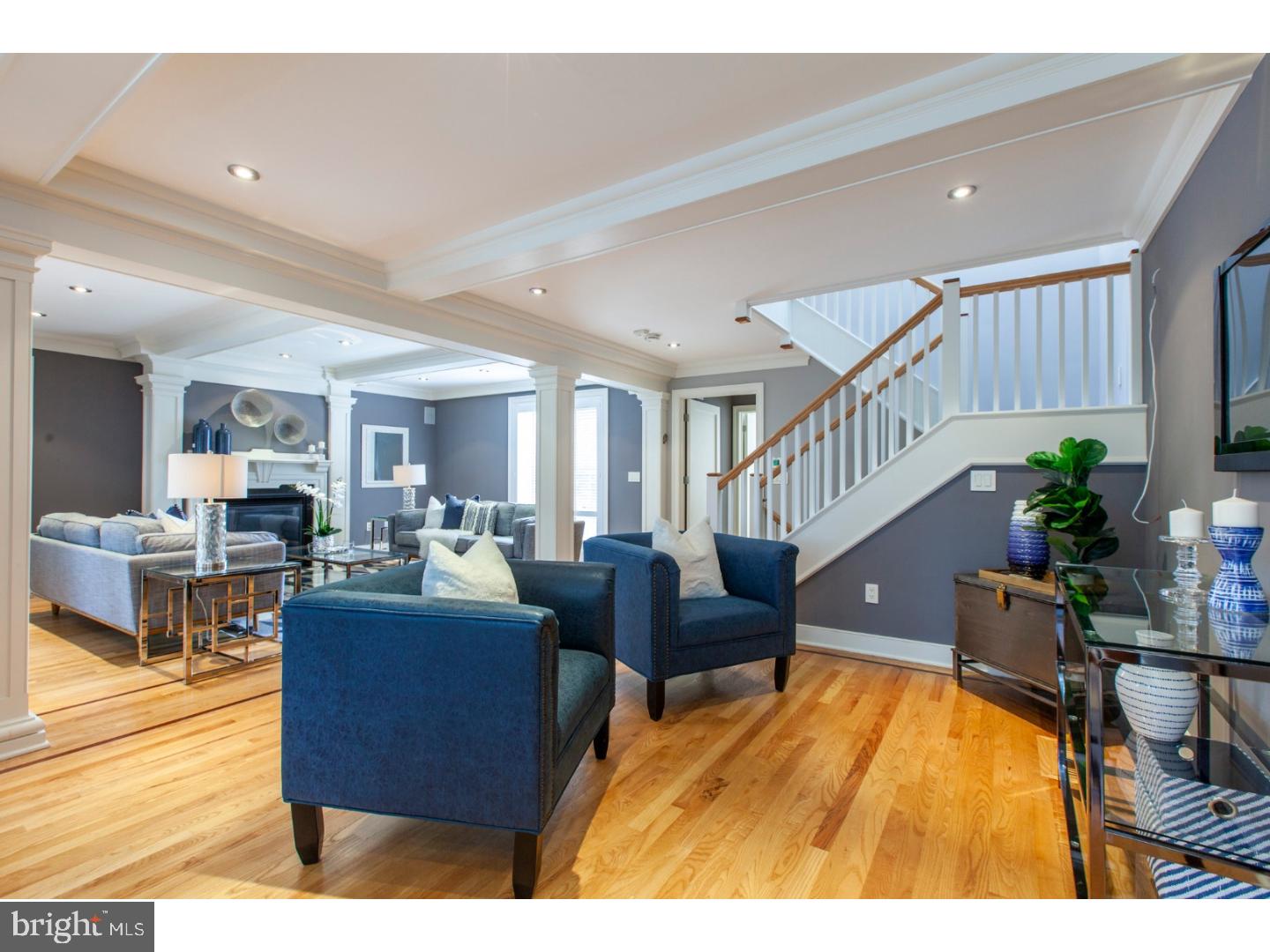 A true showpiece, this sprawling renovation sits at one of the most coveted tree-lined corners in Society Hill, and offers myriad amenities, down to the 3+ car covered parking with direct access from the finished lower level. The sweeping living/dining area on the first floor opens to a handsome chef's kitchen ? clad in teak, granite, and limestone, and with the requisite Wolf and SubZero appliances ? that overlooks a splendid private patio garden. The second floor's grand family room, trimmed with an elegant custom wet-bar and gas fireplace, is large enough for two comfortable seating areas and leads to a sun-splashed bedroom with lovely 3-piece bath and custom closet. The impressive master suite on the 3rd floor includes a magnificent marble bath and a jaw-dropping custom walk-in closet with massive amounts of storage and smartly placed laundry facilities. A third bedroom completes this floor, with its own exquisite en-suite bath and custom closet. The finished lower level of this substantial townhouse offers tons of storage and great space for a home office or gym, a fourth full bath, a custom wine cellar, and direct access to deeded parking for 3+ cars. This pristine home is perched on a quiet corner, with private access to Penn Landing Square's manicured grounds and fabulous pool, and is still just steps away from some of the best restaurants and shopping that Center City has to offer.