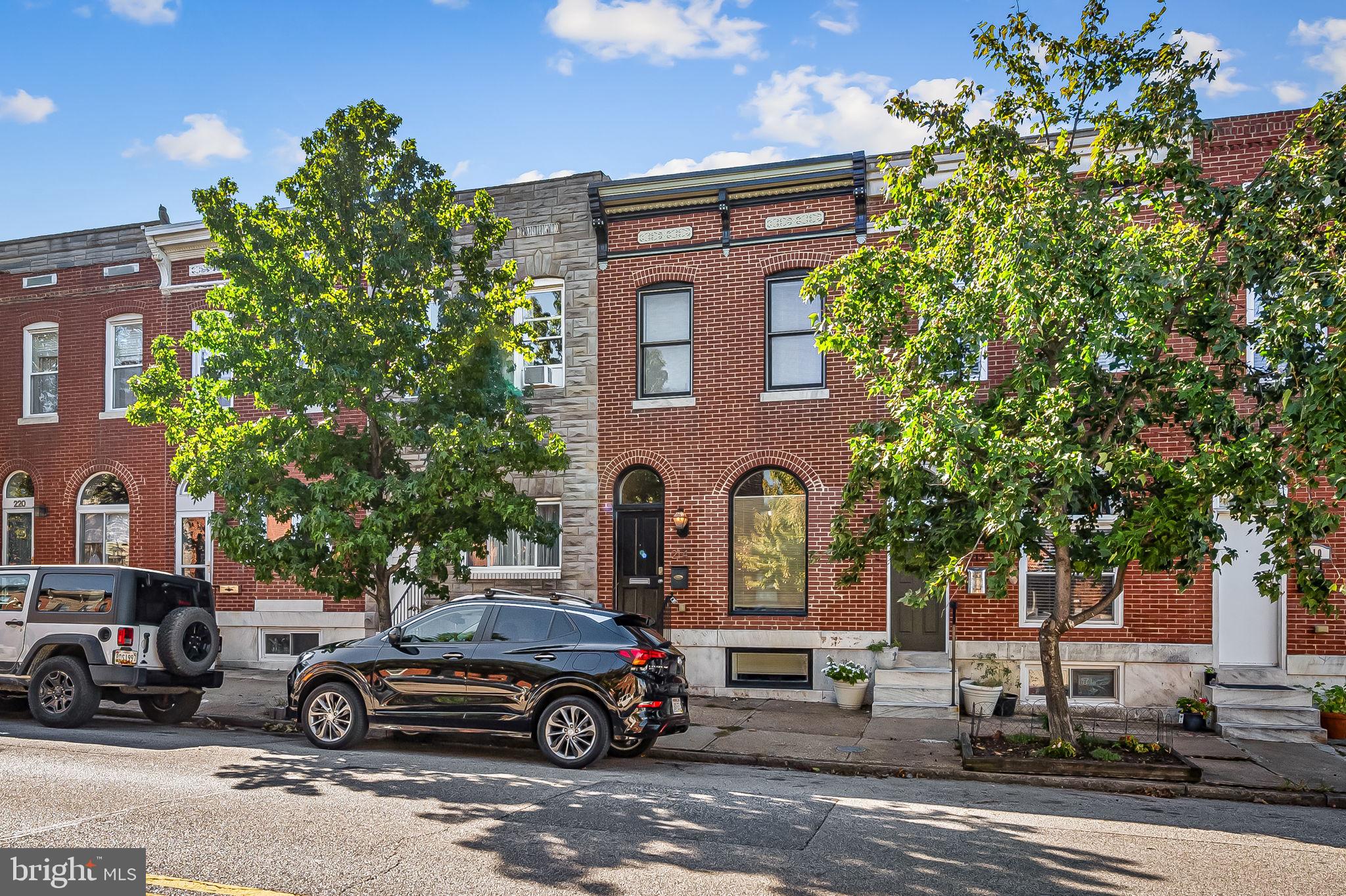 Welcome to 214 S East Avenue — a former CHAP renovation, offering 3  bedrooms, 3.5 baths, and private parking just steps from everything that Patterson Park and  Canton  have to offer.
The open main level showcases original hardwoods, exposed brick, recessed lighting, and a spacious living area with great natural light. The gourmet kitchen features granite countertops, stainless steel appliances, an island with seating, and custom cabinetry — perfect for cooking or entertaining.
Upstairs, you’ll find two large bedrooms with great closet space and stylishly tiled bathrooms. The fully finished lower level serves as a third bedroom or bonus living area, complete with a full bath and flexible layout. One of the unique features of this home is the abundance of storage space not often found in the average rowhome.
Additional highlights include a convenient main-level powder room, updated systems, ceiling fans throughout, and modern finishes that blend seamlessly with classic Baltimore charm.
Ideally situated close to nightlife, commuting routes, green-space, and everything that Baltimore has to offer.