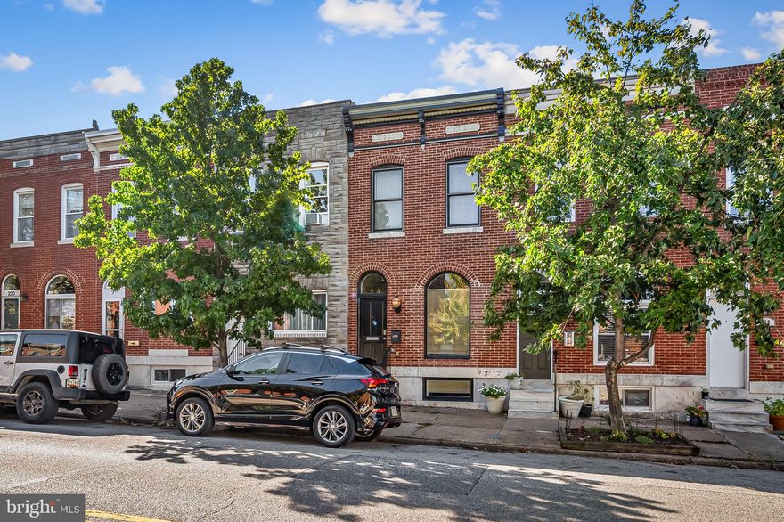 Welcome to 214 S East Avenue — a former CHAP renovation, offering 3  bedrooms, 3.5 baths, and private parking just steps from everything that Patterson Park and  Canton  have to offer.
The open main level showcases original hardwoods, exposed brick, recessed lighting, and a spacious living area with great natural light. The gourmet kitchen features granite countertops, stainless steel appliances, an island with seating, and custom cabinetry — perfect for cooking or entertaining.
Upstairs, you’ll find two large bedrooms with great closet space and stylishly tiled bathrooms. The fully finished lower level serves as a third bedroom or bonus living area, complete with a full bath and flexible layout. One of the unique features of this home is the abundance of storage space not often found in the average rowhome.
Additional highlights include a convenient main-level powder room, updated systems, ceiling fans throughout, and modern finishes that blend seamlessly with classic Baltimore charm.
Ideally situated close to nightlife, commuting routes, green-space, and everything that Baltimore has to offer.