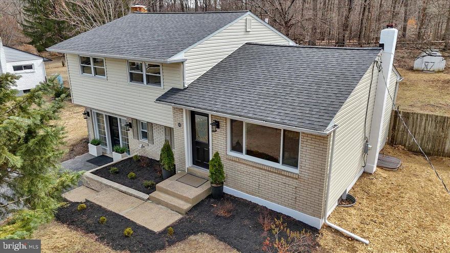 Sunset Grove development beautifully rehabbed completely from the bottom up. This home will not disappoint! The 3 bedroom, 2 bath split level home is practically new construction with modern kitchen, new Bosch hvac heat pump & central air, new roof, new siding, new stainless steel appliances, new 2 amazing bathrooms, hardwood floors and new luxury plank laminate flooring, new wiring and insulation, covered porch out back, finished lower level with powder room/ laundry, fireplace, public sewer/well water(new well pump), off street parking. With the low taxes only $3782, this house is a more affordable option to look at. Better than new...... Call today!