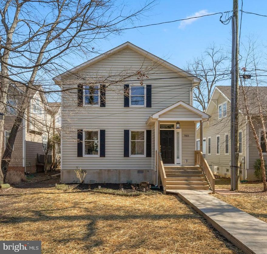 Welcome home to your  Chesapeake Bay front dream!  Completely renovated in 2021, this colonial sits off the beaten path in Annapolis & has it all!  From the sandy beach with stunning Bay Bridge views to the gorgeous kitchen, 3 fully renovated bathrooms, new hardwood floors, fresh paint there are designer finishes throughout.  Kitchen offers white shaker cabinets, gorgeous quartz counters and glass tiled backsplash.  New stainless appliances, spacious island with seating, additional counter space all open to the living room.  Natural light pours through the windows, offering the perfect place to relax and watch the boats ride by.  The spacious primary bedroom has stunning walls of windows with a Juliette balcony facing the bay.  Huge walk in closet and completely renovated private bath with dual sink vanity, tiled shower with custom glass doors.  The upper level offers 2 additional bedrooms and a designer full bathroom.  Main floor with 9' ceilings offers a 4th bedroom or home office and a 3rd full bathroom, featuring gorgeous tile work & an open concept great room.  Spacious laundry/mud room, rear deck, long pier, and so much more.  Close to downtown Annapolis, shopping, dining, entertainment & major commuter routes. Schedule your tour today!