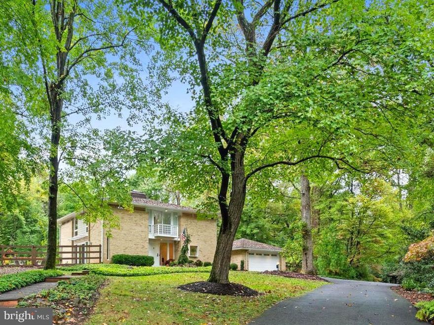 Absolutely immaculate! Updated over the past three years, this move-in ready contemporary in Potomac is ready to welcome the most fastidious buyers. Serenely nestled amongst trees on a quiet cul-de-sac in the desirable Timberwood of Potomac neighborhood, this stunning five bedroom / three-and-one-half bathroom contemporary home has thoughtful updates throughout. Floor-to-ceiling windows, multiple skylights, and abundant use of glass doors that welcome in the natural light and provide peaceful, natural views. Enjoying multiple patios, this property's impeccable landscaping envelops you in a world of privacy and tranquility, surrounded by mature trees and lush greenery. This exquisite 4,100+/- home features custom finishes, dramatic light fixtures and hardware, recessed lighting, and wood-beamed ceilings.

The gracious center-hall foyer has beautiful steel and wooden pegged design hardwood floors and leads to both the formal dining room and spacious living room. Offering a fireplace and sliding glass doors to the side patio and beyond to the fenced-in verdant backyard, the living room is the perfect gathering place. The sleek chef’s kitchen features state-of-the-art appliances, a center island with a breakfast bar, and a bright and cheery breakfast room with access to the rear patio - all ideal for family living and entertaining. This exquisite kitchen is open to the family room with recessed Sonos speakers, which also enjoys back patio access, adding to the excellent flow of the home. There is an updated mudroom / laundry room purposefully located off of the attached two-car garage, complete with extra storage space. A handsome study with built-ins and a wet bar, as well as an elegant powder room are also located on the first floor.

The second level is highlighted by the expansive owner’s suite with a wonderful balcony - taking full advantage of the peaceful views - a custom walk-in closet, as well as a spa-like full bathroom with a separate luxurious soaking tub and dual sinks. Three additional sun-filled bedrooms, a shared balcony, and another full bath complete the second floor. The fifth bedroom, a full bath, a sizable recreation room, and ample storage can be found on the lower level. 

Additional offerings include a spacious driveway, an electric car charger, a new water heater, newly-zoned AC and electric heat, a new privacy fence, and a refreshed professionally-landscaped rear and side yards. 2004 installation of new roof (to be completed in October 2024.) 9420 Garden Court offers a serene retreat that is still within easy reach of the conveniences of city life. A must-see! (Square footage is deemed accurate but not guaranteed.)