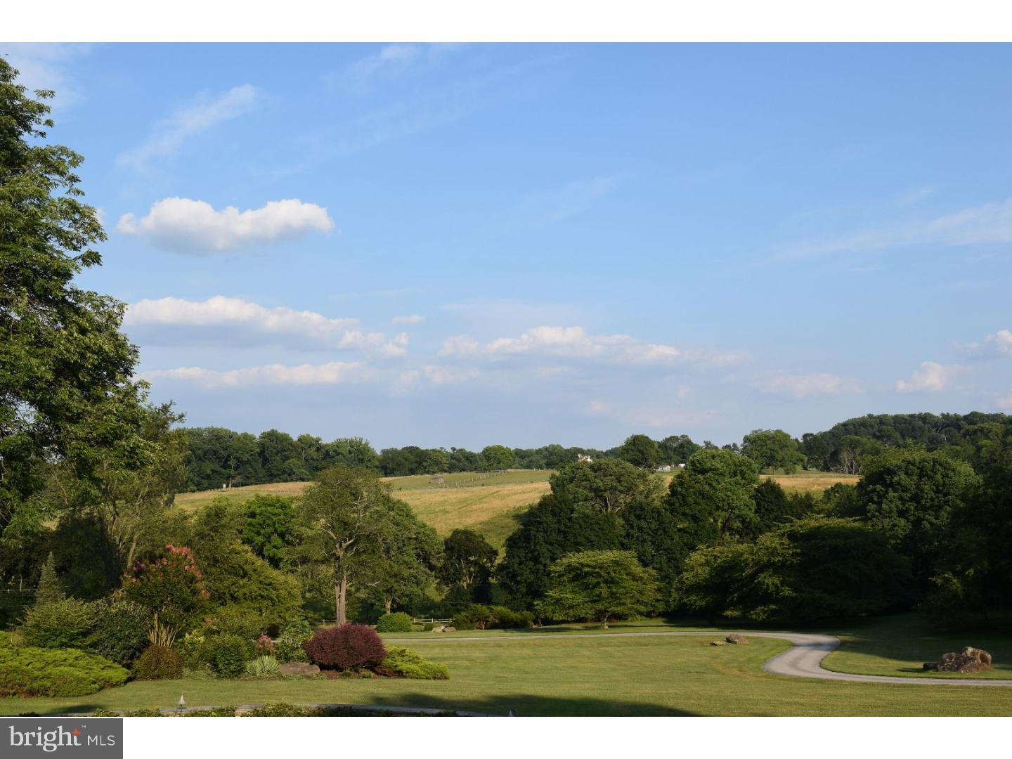 The location and view you have been waiting for in Willistown! Your home can be your vacation home !The 6.9 acre hilltop setting of this home affords without question one of finest protected views in Willistown. The property was designed so every room could take full advantage of the breathtaking views of Kirkwood Preserve's 80+ acres of rolling hills. This setting and view embody all the reasons Willistown has become such a coveted place to live. A pool, sauna, spa and tennis court are but of few of the many amenities this vacation-like home offers. The open floor plan, soaring ceilings and flexible living spaces provide many lifestyle options. A sweeping drive leads up to the formal arrival court and front door which opens to a dramatic 2 story reception hall on the ground level. An open stair case leads up to the living room, dining room, kitchen, family room w/bar, laundry and work shop on the first floor. The master suite, two family bedrooms & hall bath comprise the 2nd floor. Two other bedrooms, a full bath & wine cellar are on the ground level. The property has been well maintained by the original owner for the past 30 years. The roof, HVAC, and appliances are all newer. This property must be seen to be fully appreciated! Kirkwood Preserve, directly across Grubbs Mill Rd from # 846 is the best neighbor ?The majority of the 83-acre Preserve is grassland, which serves as an important haven for birds and other wildlife. The preserve also contains pedestrian and equestrian trails, a half-mile stretch of the Crum Creek, approximately 21 acres of wet areas, and 1.5 acres of upland and riparian woodland. Under the Willistown Conservation Trust's ownership and management, Kirkwood Preserve provides excellent habitat for a great number of species, and the opportunity for people to enjoy an exquisite landscape in its natural state.