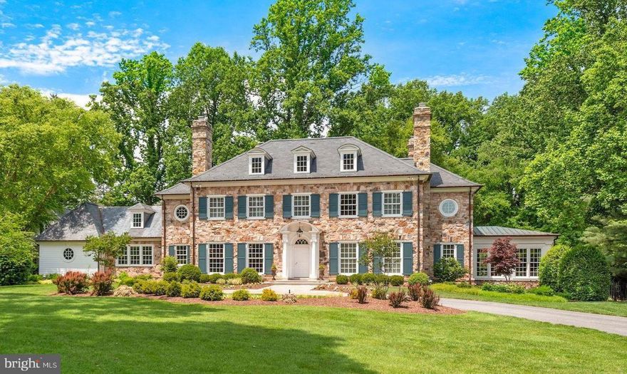 Welcome to 9000 Congressional Parkway, a private estate on almost four acres in the exclusive Golden Horseshoe. This impressive Georgian home with full stone exterior, slate roof, copper gutters, unrivaled millwork and wide plank heart pine floors boasts an expansive, level lot with mature trees and professionally designed landscaping. The amenities include a heated saltwater pool with hot tub and motorized cover, pool house with new kitchenette and new bathroom, expansive outdoor patios and covered terraces perfect for grand entertaining, stone-enclosed wine cellar and tasting room, multiple studies and office areas, billiards room, guest apartment with new kitchen and laundry, theatre room, seven wood burning fireplaces and more. Designed by Neumann Versace Buchanan (NLB Architects) then constructed by master builder O'Neill Development. 

The grand kitchen with new eight burner Viking range, two large sinks, two Miele dishwashers, and walk-in butlers pantry connects to screened porch, home office, and mudroom with laundry while offering panoramic views over both the front and rear grounds. The grand two-story living room with overlook and three sets of french doors walks out onto the covered slate terrace and 100 foot patio. The full paneled library with fireplace connects to the billiards room or office through a wet bar and has a hidden staircase to wine cellar and tasting room.

Upstairs the luxurious master suite with fireplace and built-ins overlooks the lush fully fenced rear yard and steps to the freshly renovated spa bathroom with heated floors and steam shower.  The stunning guest apartment is brand new with full kitchen, laundry, luxurious bedroom, living area, and two hidden trundle beds. Additional guest quarters with fireplace and ensuite bathroom are located in the lower level.

Pool house was just renovated with full bath, kitchenette, slate floor, and sunny entertainment area with speakers, TV and mesh wifi. The heated saltwater pool and spa features automated controls and remote cover. An extra deep three car garage has workshop nook and is connected to the mudroom by a stone breezeway. Lower level has a fitness room, craft or play room, huge centrally located recreation room with multimedia, double layer safe room, and a Dolby 7.2 theatre room with THX speakers and DLP projector.

Many areas of the home are freshly remodeled including all bathrooms, all three laundry rooms, most HVAC systems, and most appliances. Additional amenities include public water, public sewer, multi zone Sonos speaker system, Wifi mesh network, Verizon FIOS fiber optics, irrigation system, central vacuum, and a 47kw Cummins backup generator.  

Just a two-minute walk to Avenel Park (pathway near the end of the driveway), a mile to Congressional Country Club, a mile and a half to Potomac Village, and offers easy access to the Capital Beltway and Palisades DC.  Click virtual tour link to see floor-plans and aerial video tour.